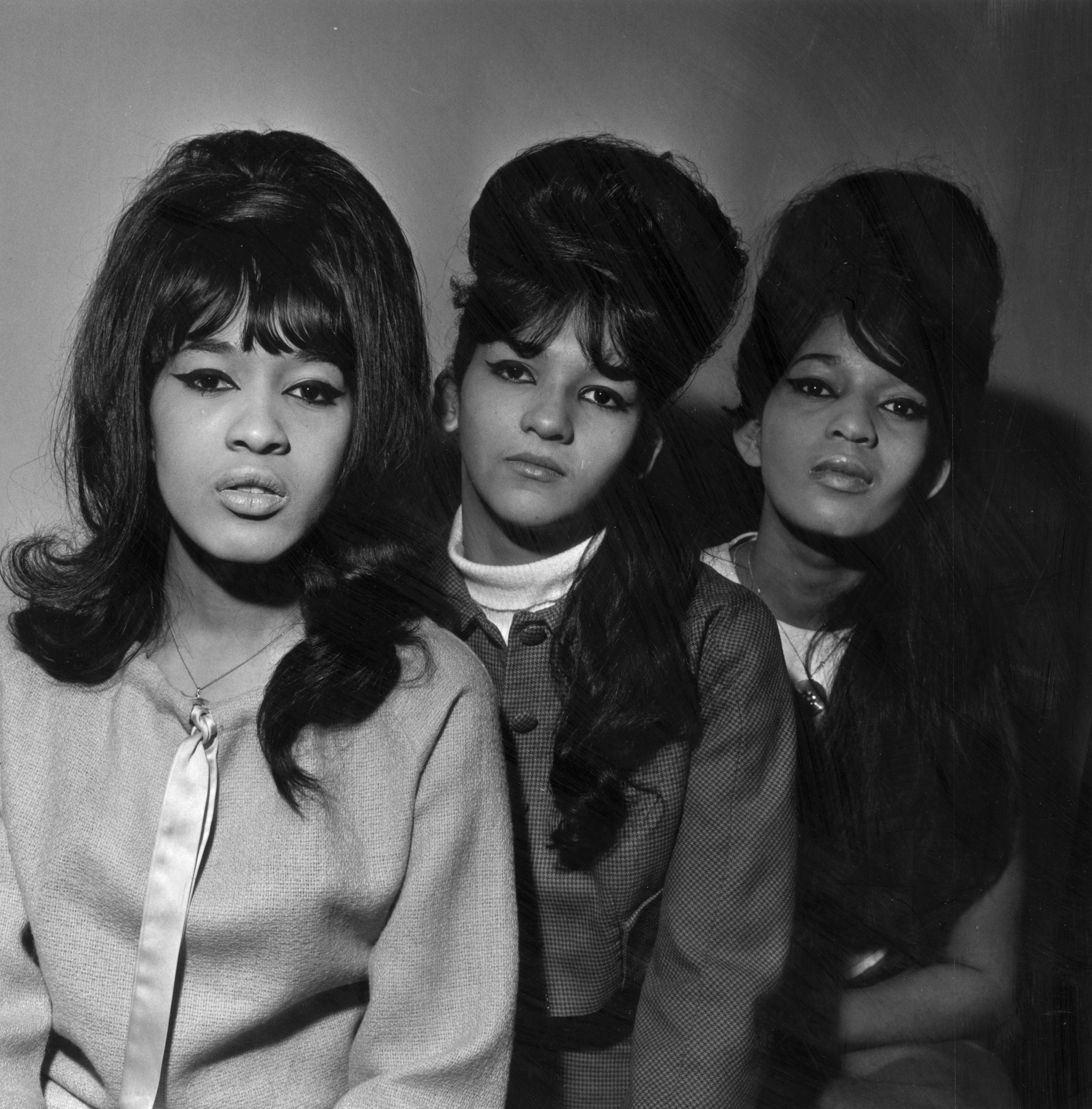 The Ronettes (left to right) singers Veronica 'Ronnie' Bennett, Nedra Talley and Estelle Bennett, an American pop trio produced by Phil Spector