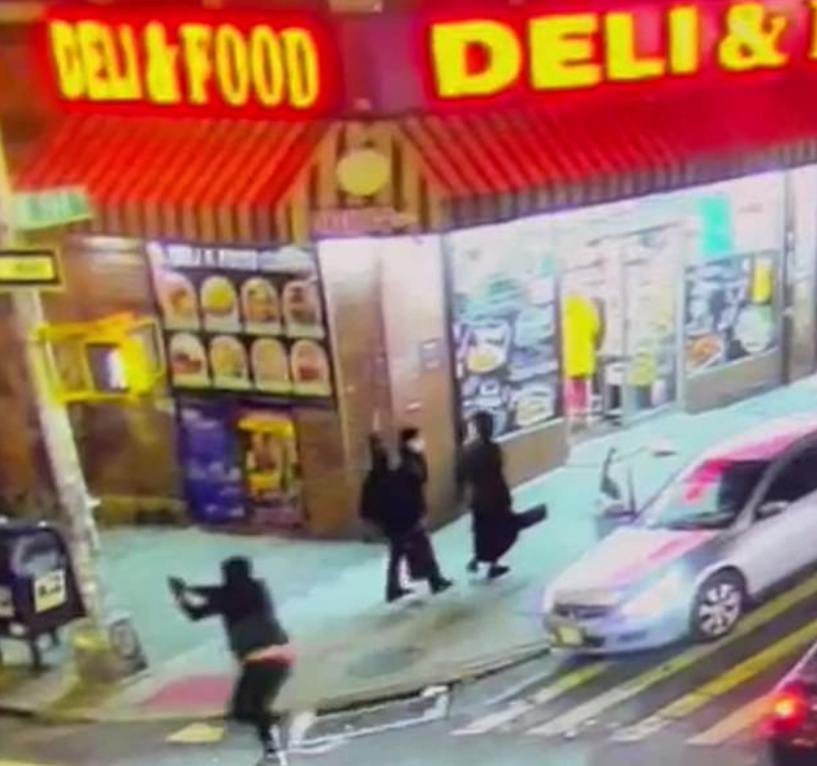 Surveillance footage shows the gunman firing at another suspect in the Bronx on Wednesday night