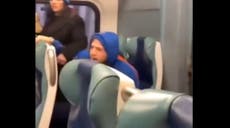 Pair charged with hate crimes for abusing woman on New York train after being caught in viral video