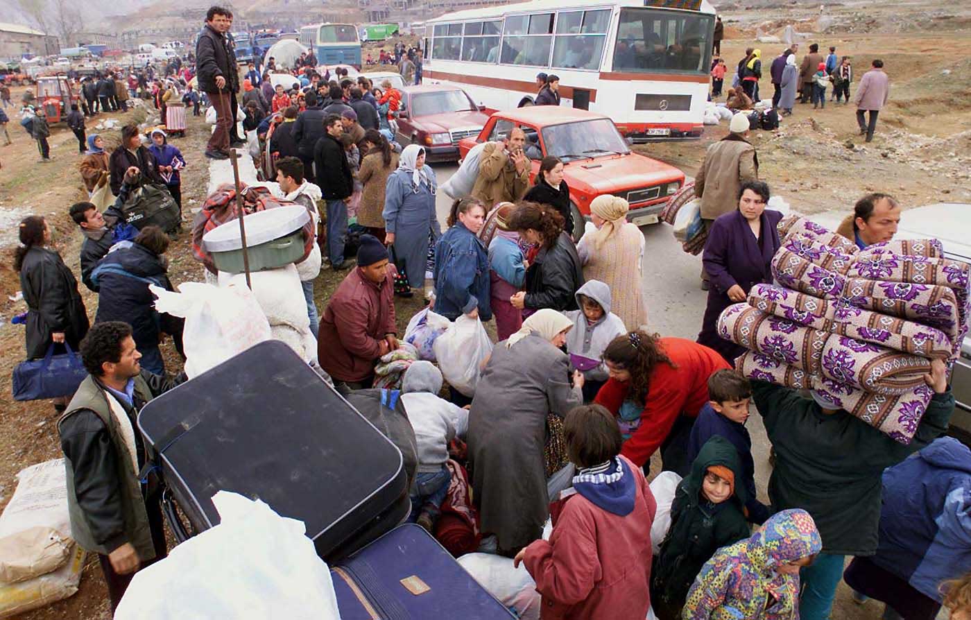 Thousands of ethnic Albanian refugees from Kosovo arrive early morning Wednesday, 31 March 1999 in Kukes, northern Albania