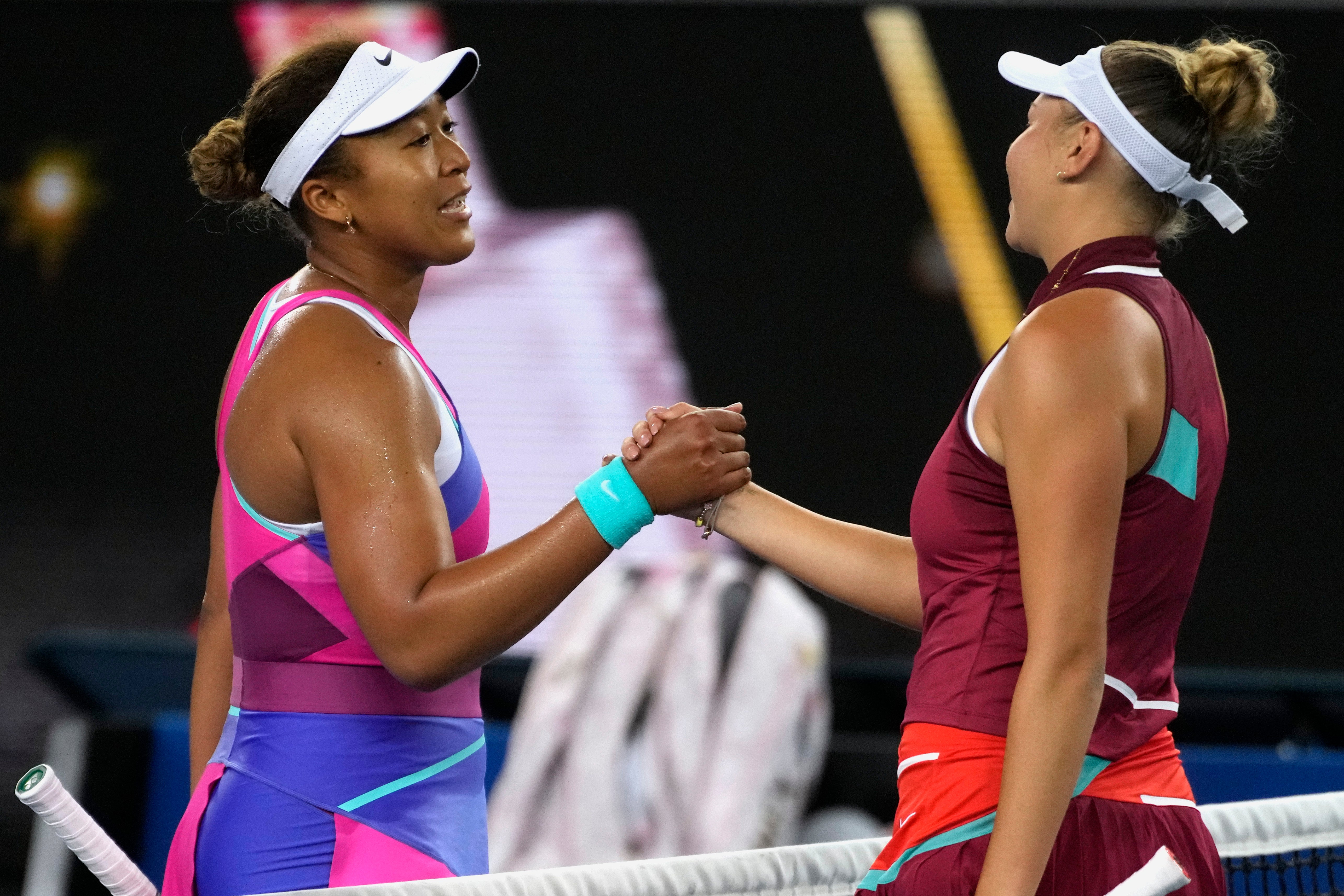 Naomi Osaka, left, was beaten by Amanda Anisimova (Simon Baker/AP)