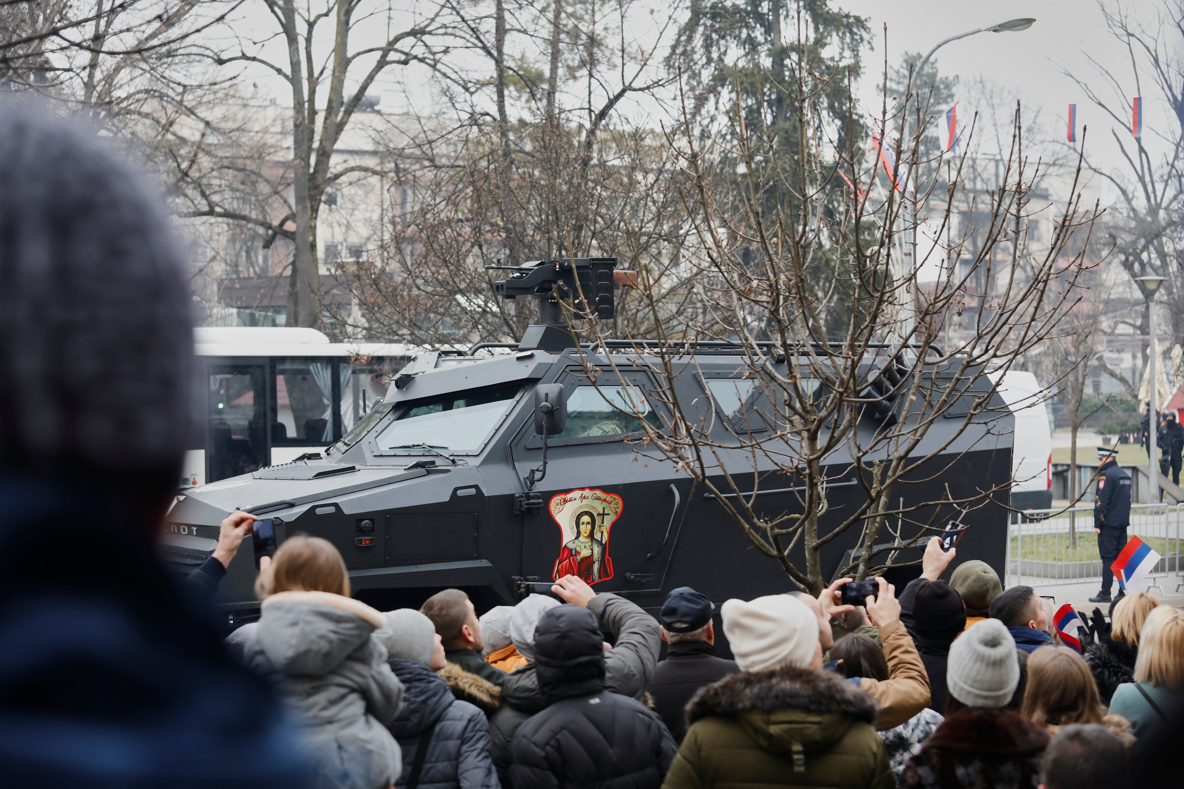 Locally made armoured vehicles were decorated with portraits of Serbian orthodox saints for the parade