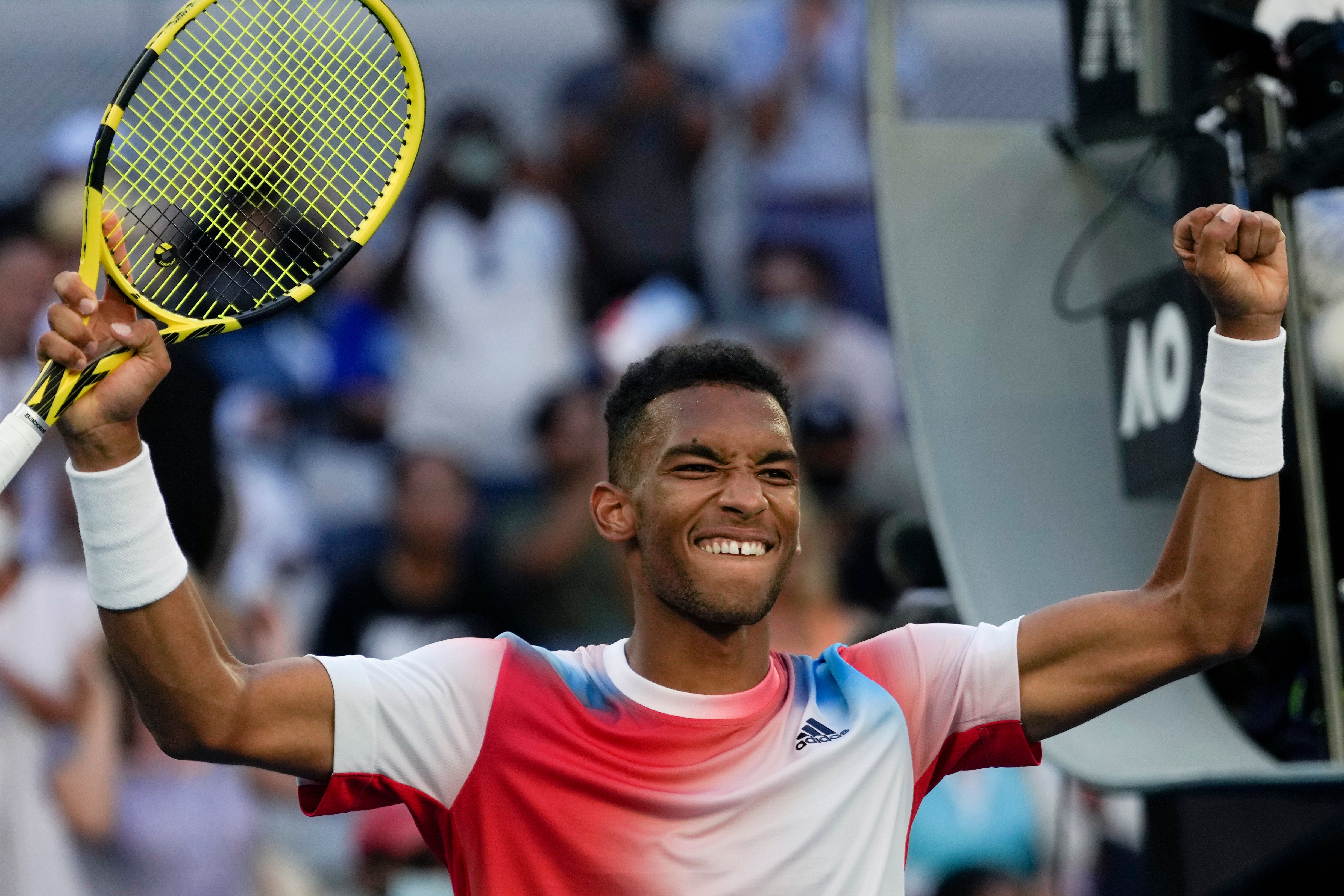 Auger-Aliassime celebrates his win