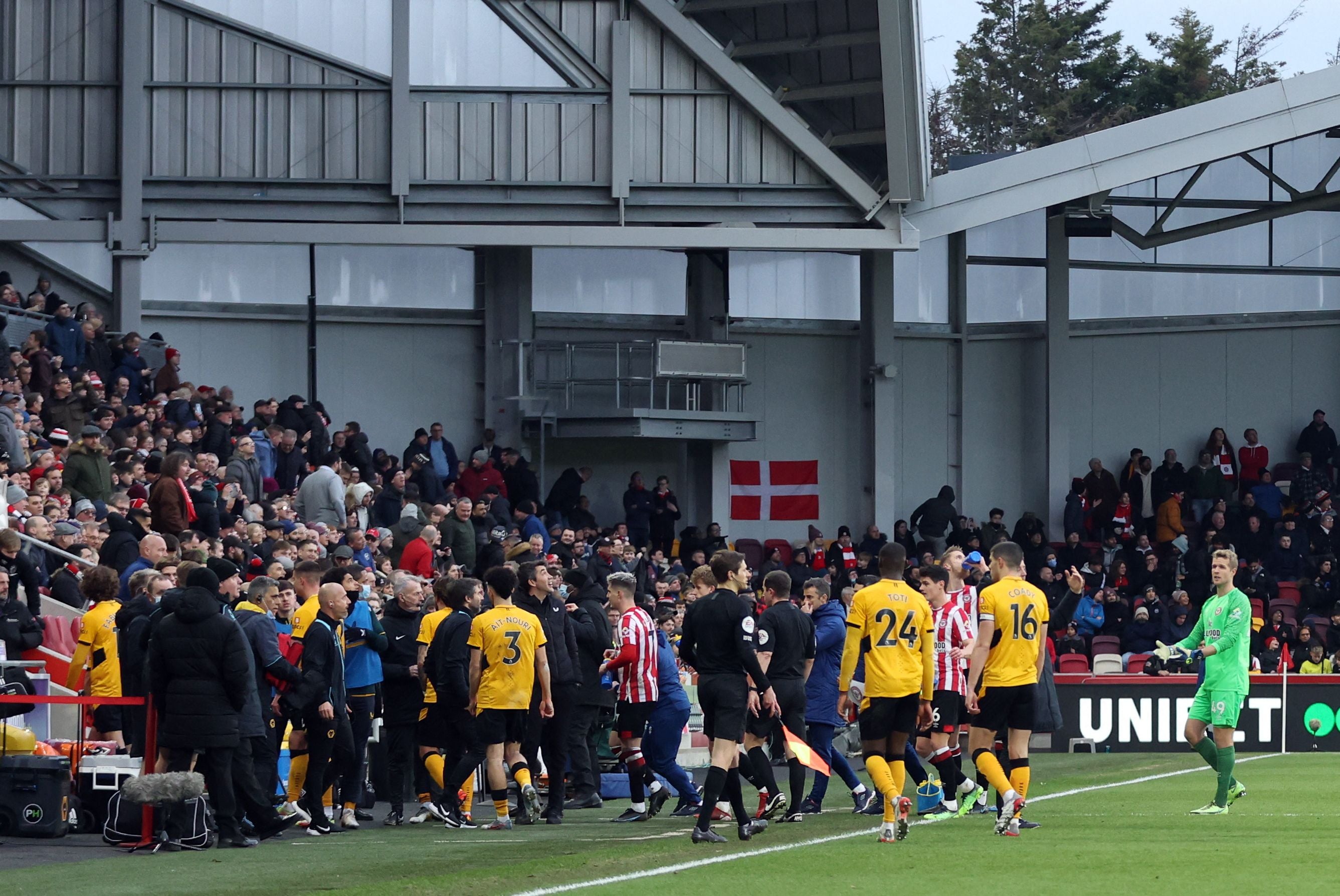 Brentford and Wolves players leave the field