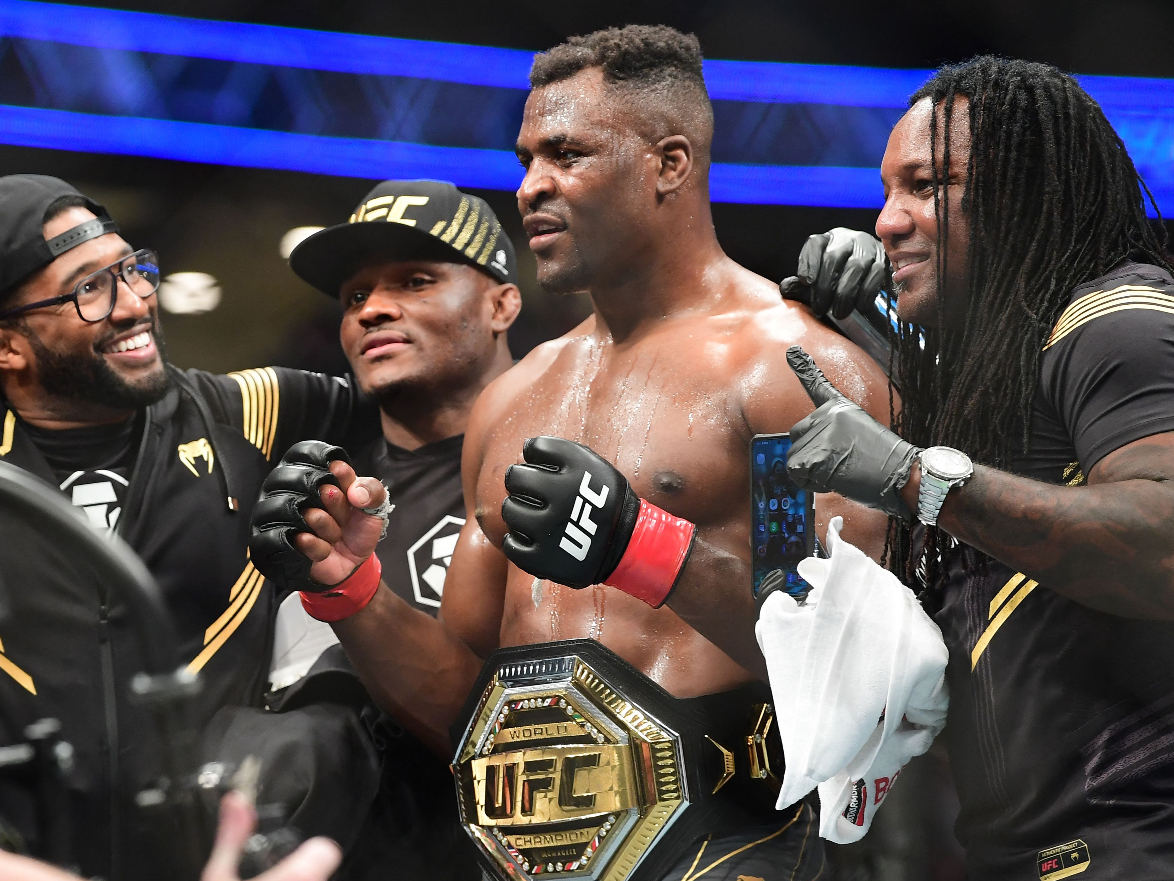 Francis Ngannou celebrates his win against Ciryl Gane