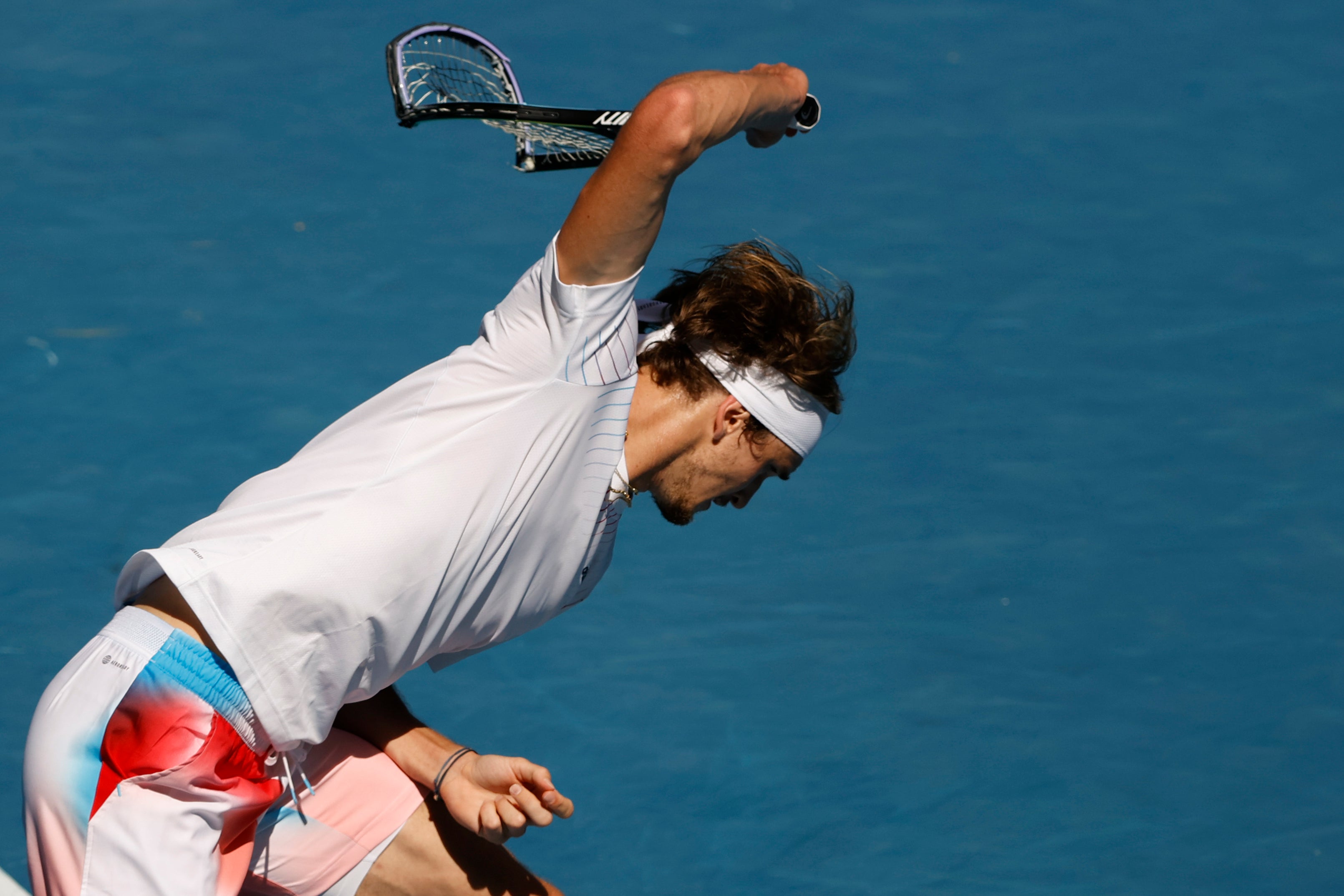 Alexander Zverev smashes his racket in frustration (Tertius Pickard/AP)