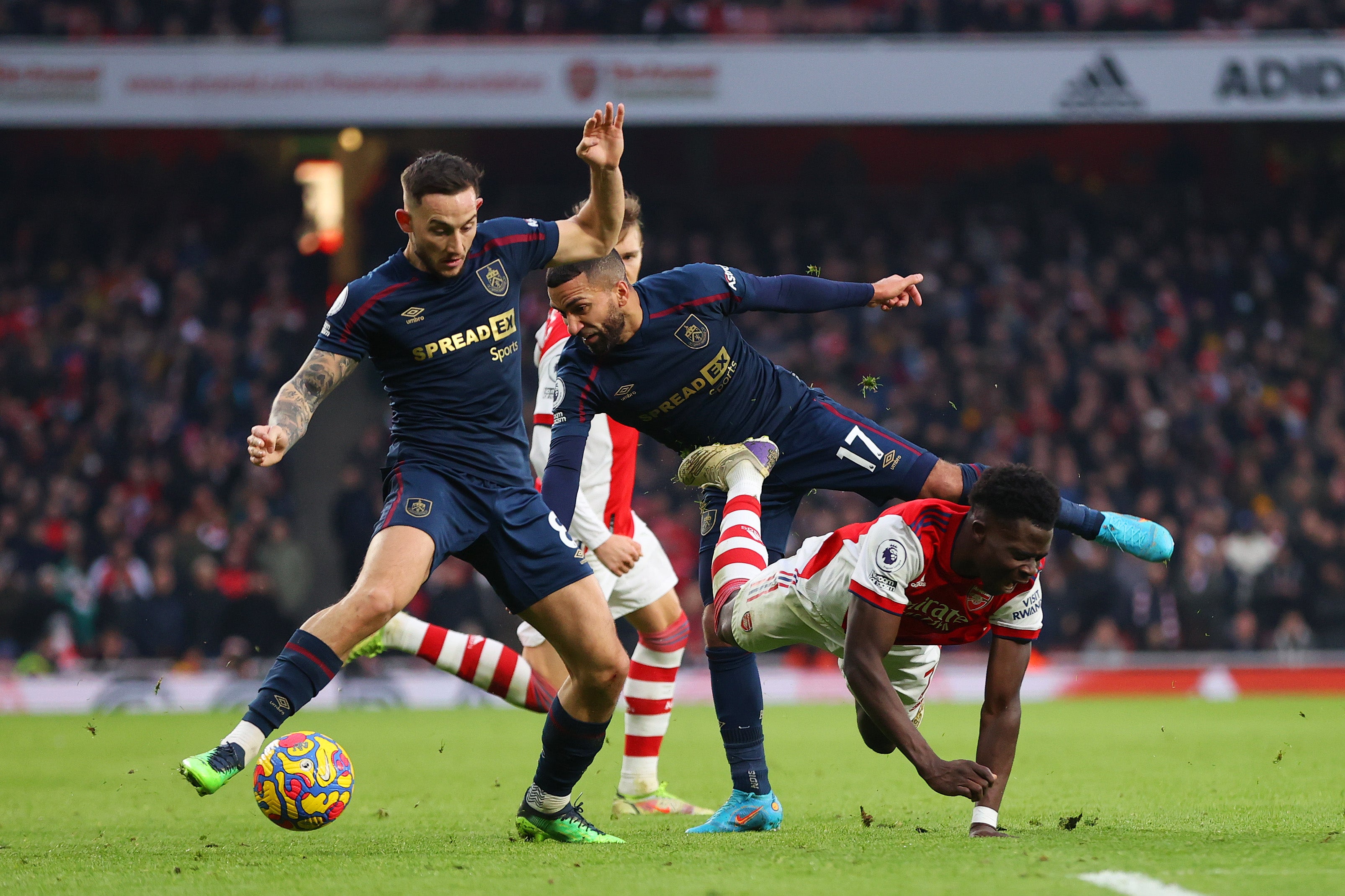 Bukayo Saka is fouled by Aaron Lennon