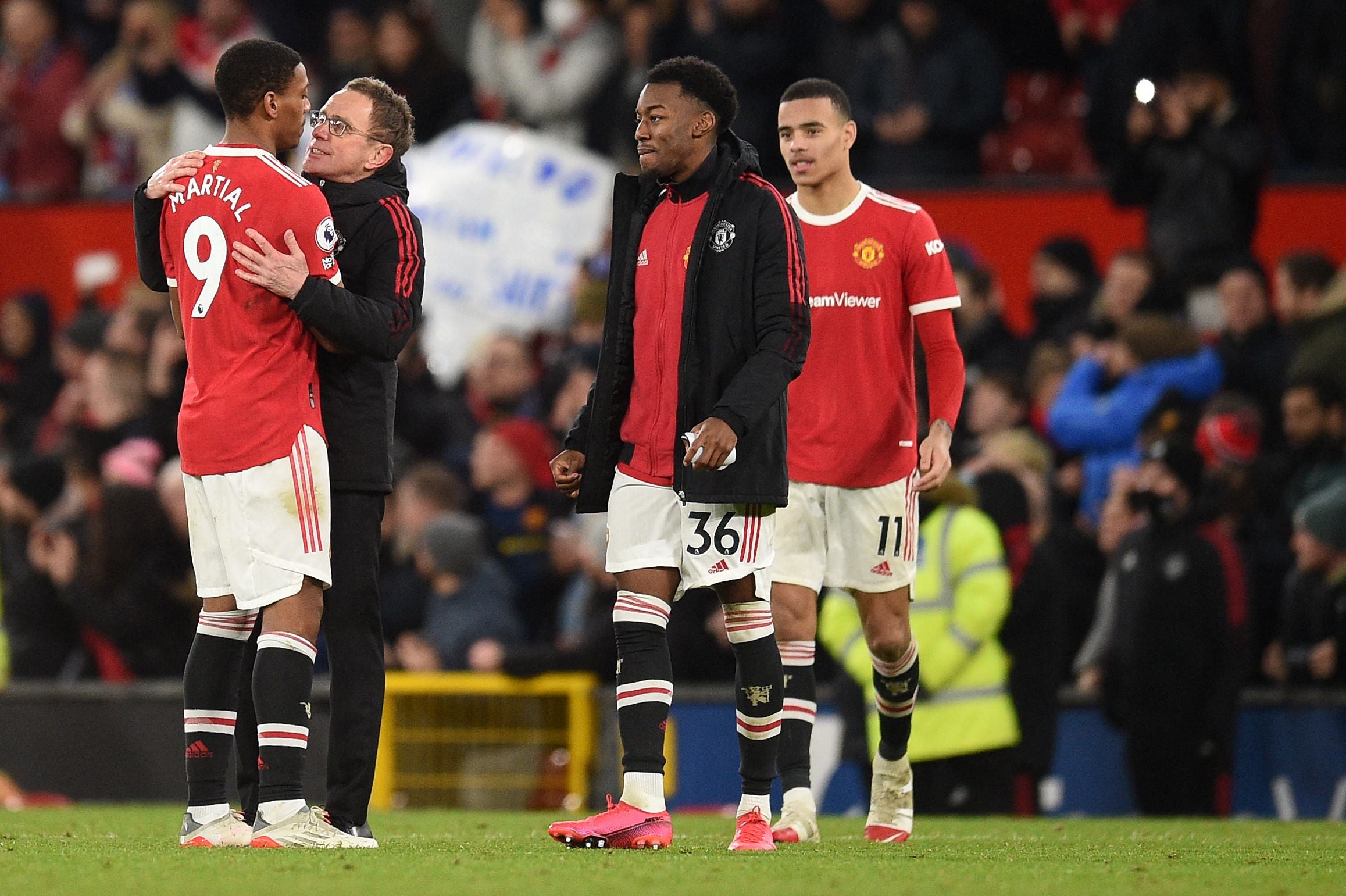 Anthony Martial is hugged by Ralf Rangnick