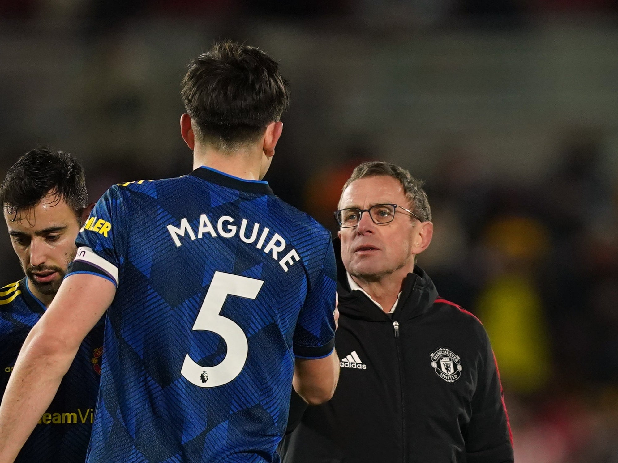 Ralf Rangnick speaks to Manchester United captain Harry Maguire