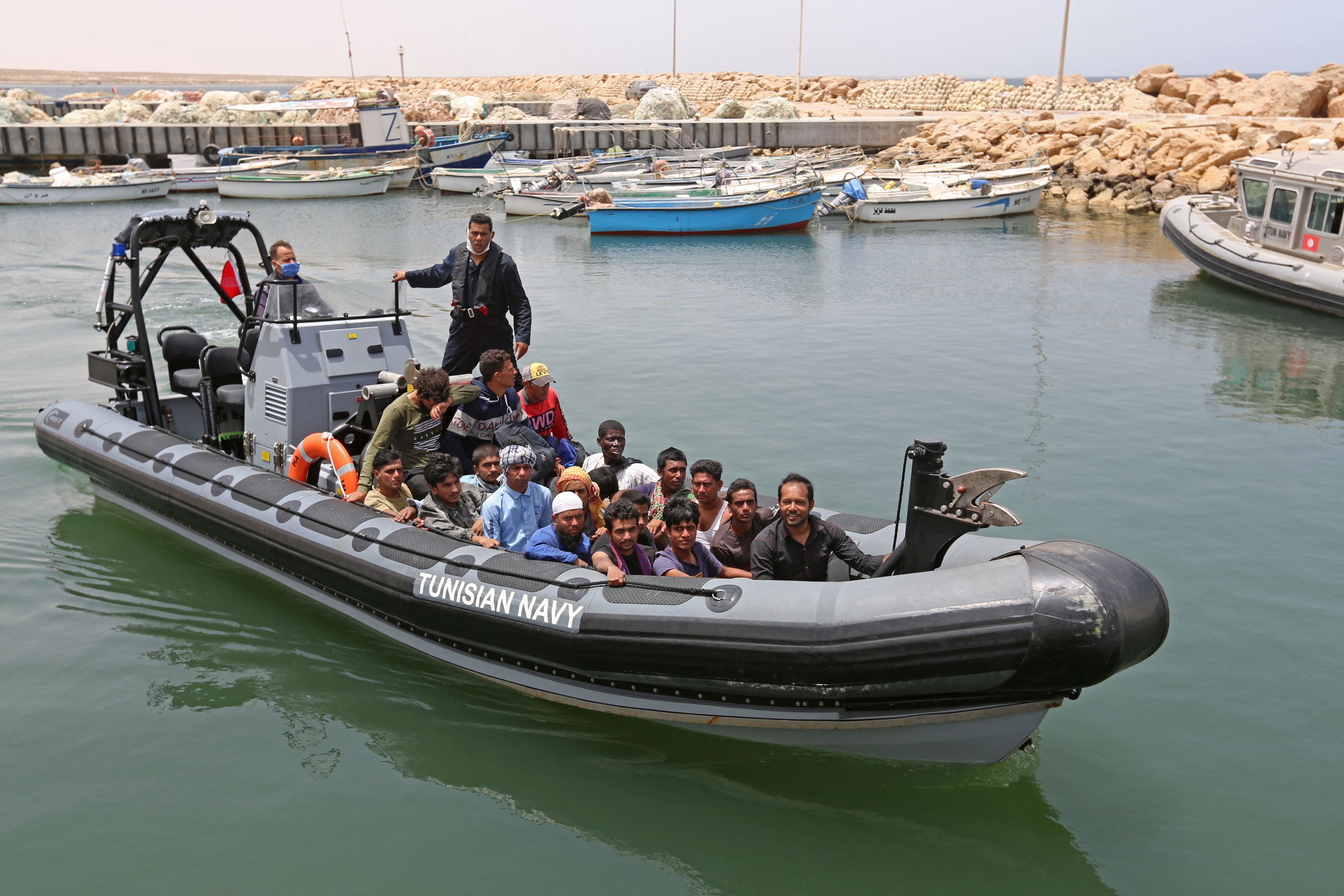 Migrants rescued by Tunisia’s national guard arrive in Ben Guerdane, southern Tunisia, 27 June 2021