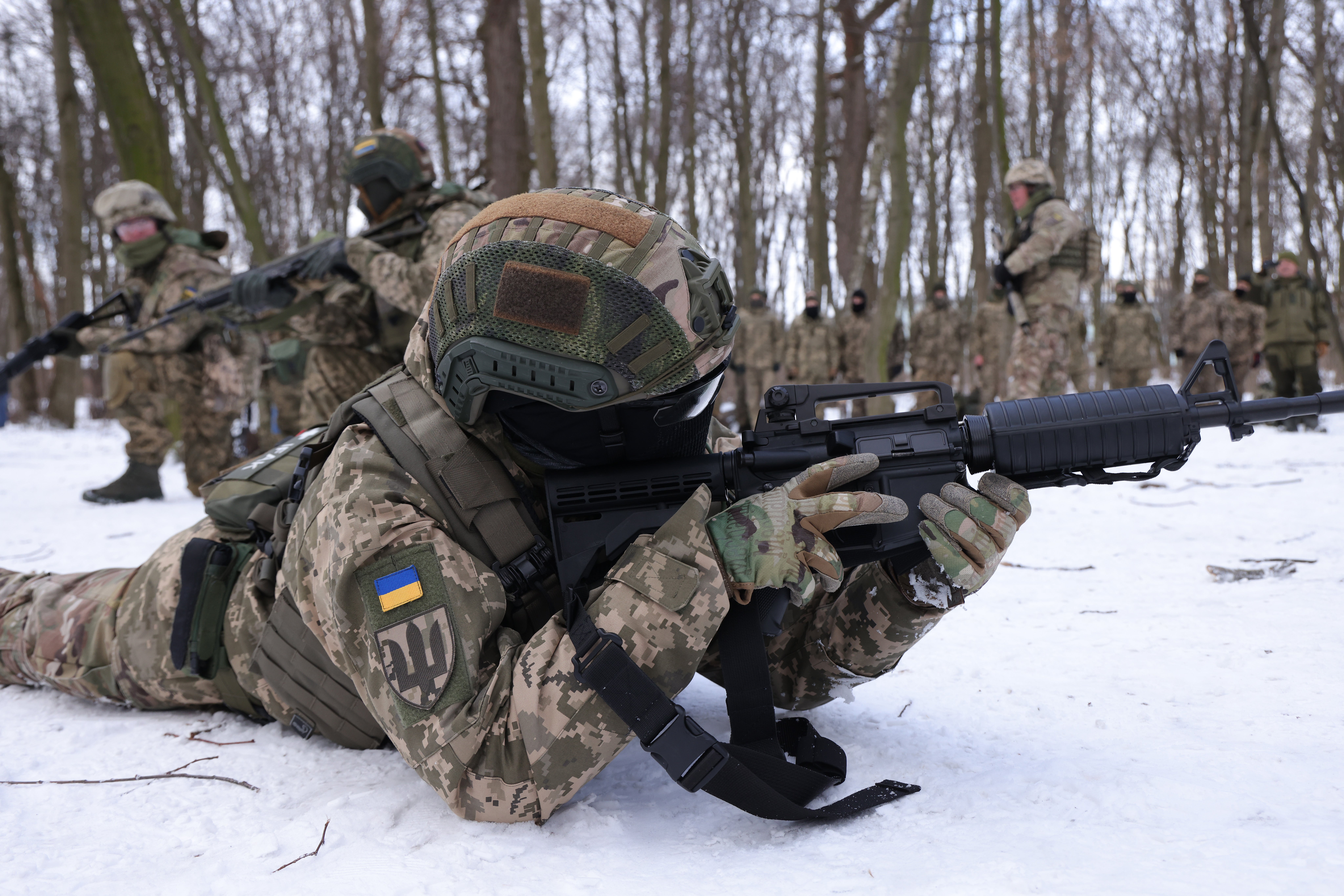 Civilian participants in a Kyiv Territorial Defence unit train on a Saturday in a forest in Kyiv, Ukraine