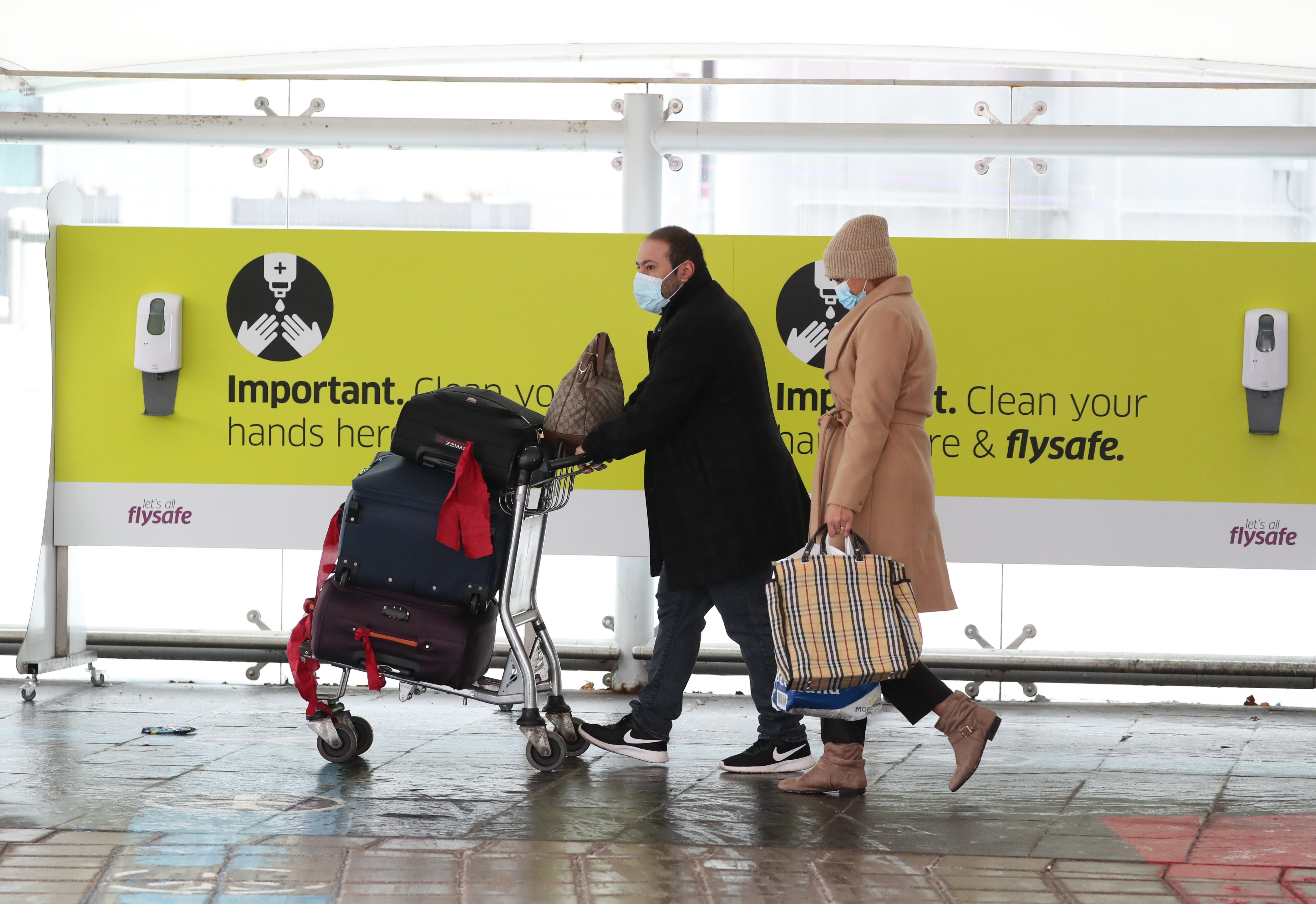 Fully-vaccinated people will no longer have to take a Covid test when arriving into Scotland (Andrew Milligan/PA)