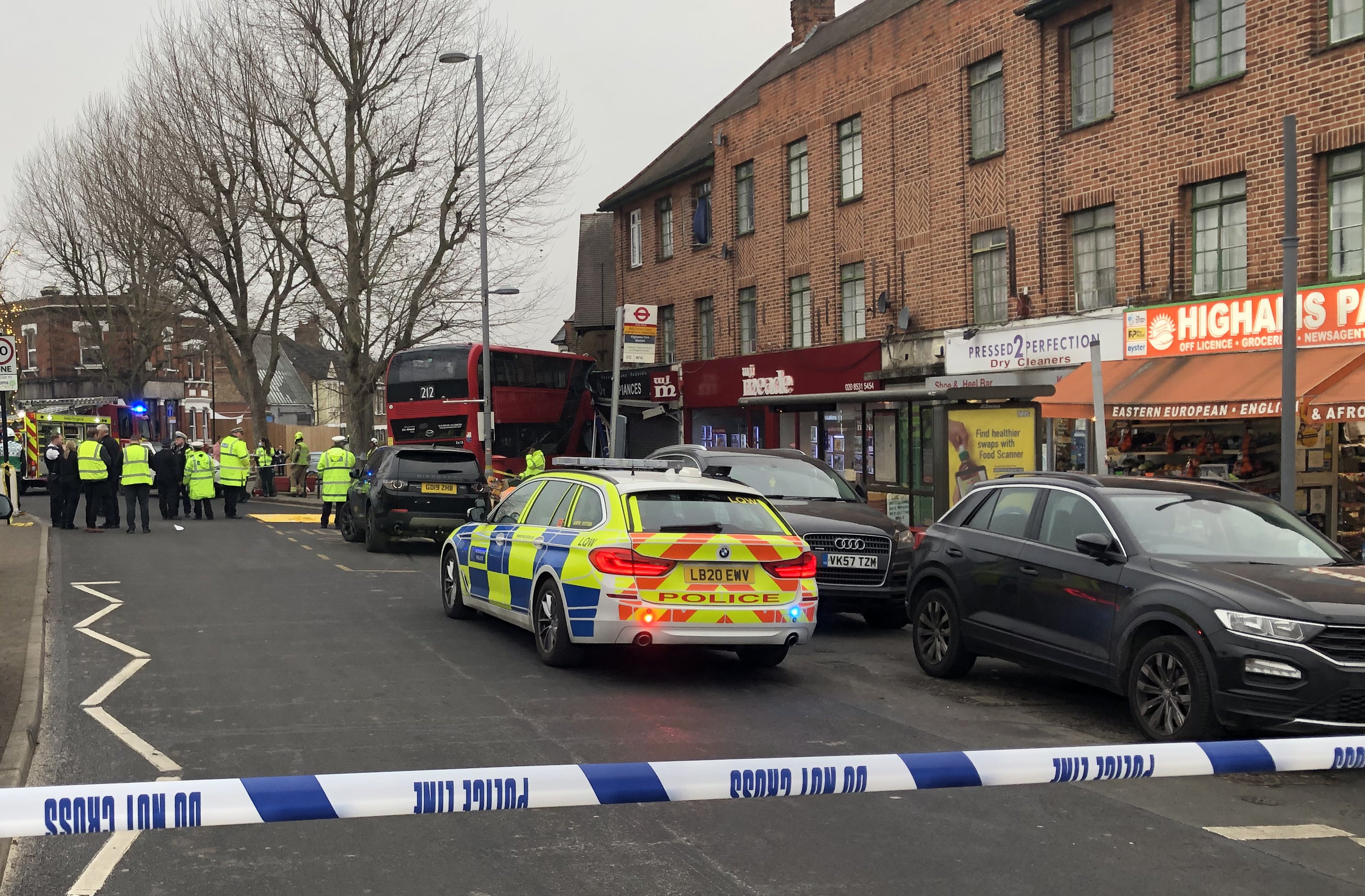 Emergency services at the scene on The Broadway in Highams Park, east London (Tom Smith/PA)