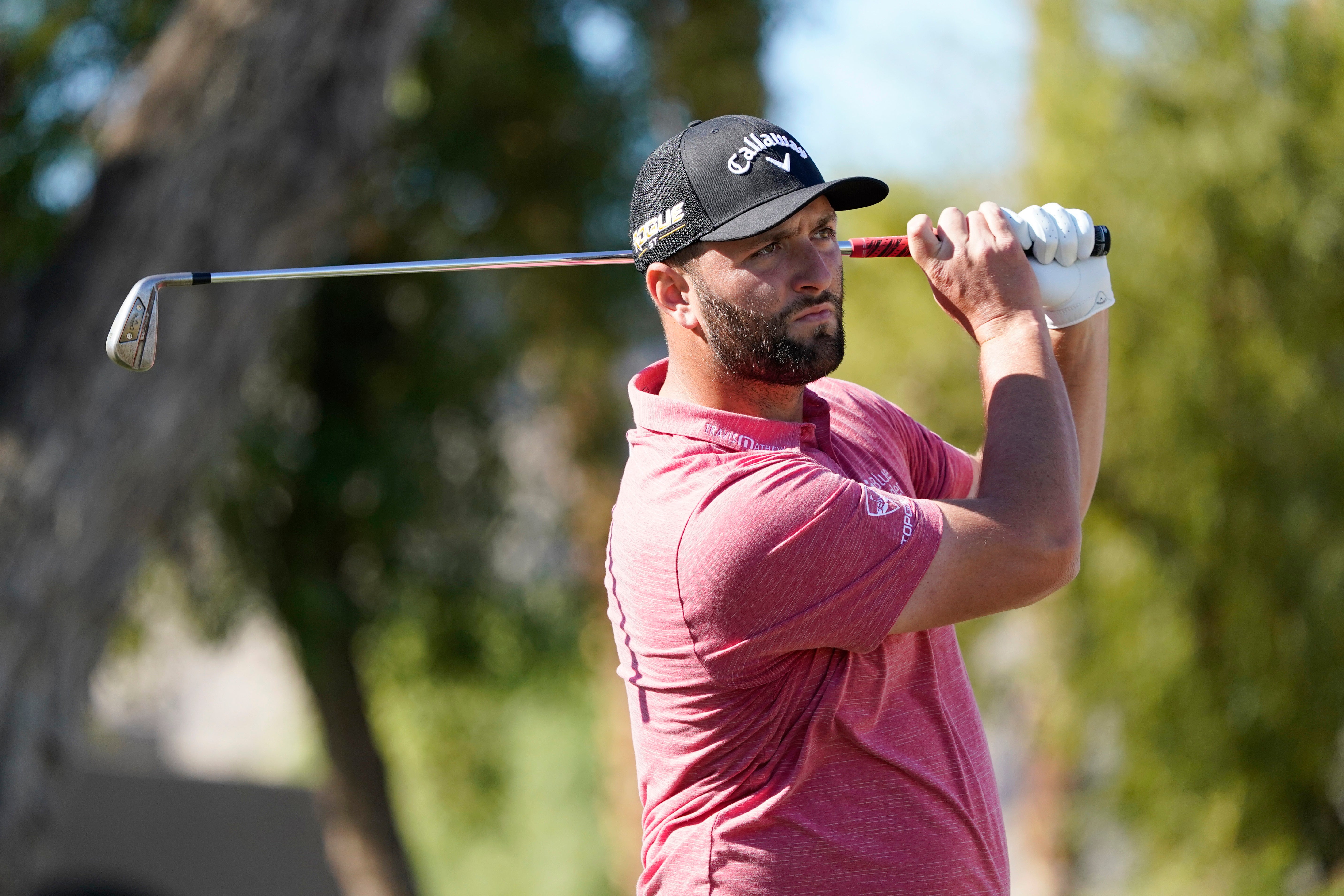 Jon Rahm returns to the scene of his US Open triumph this week (Marcio Jose Sanchez/AP)