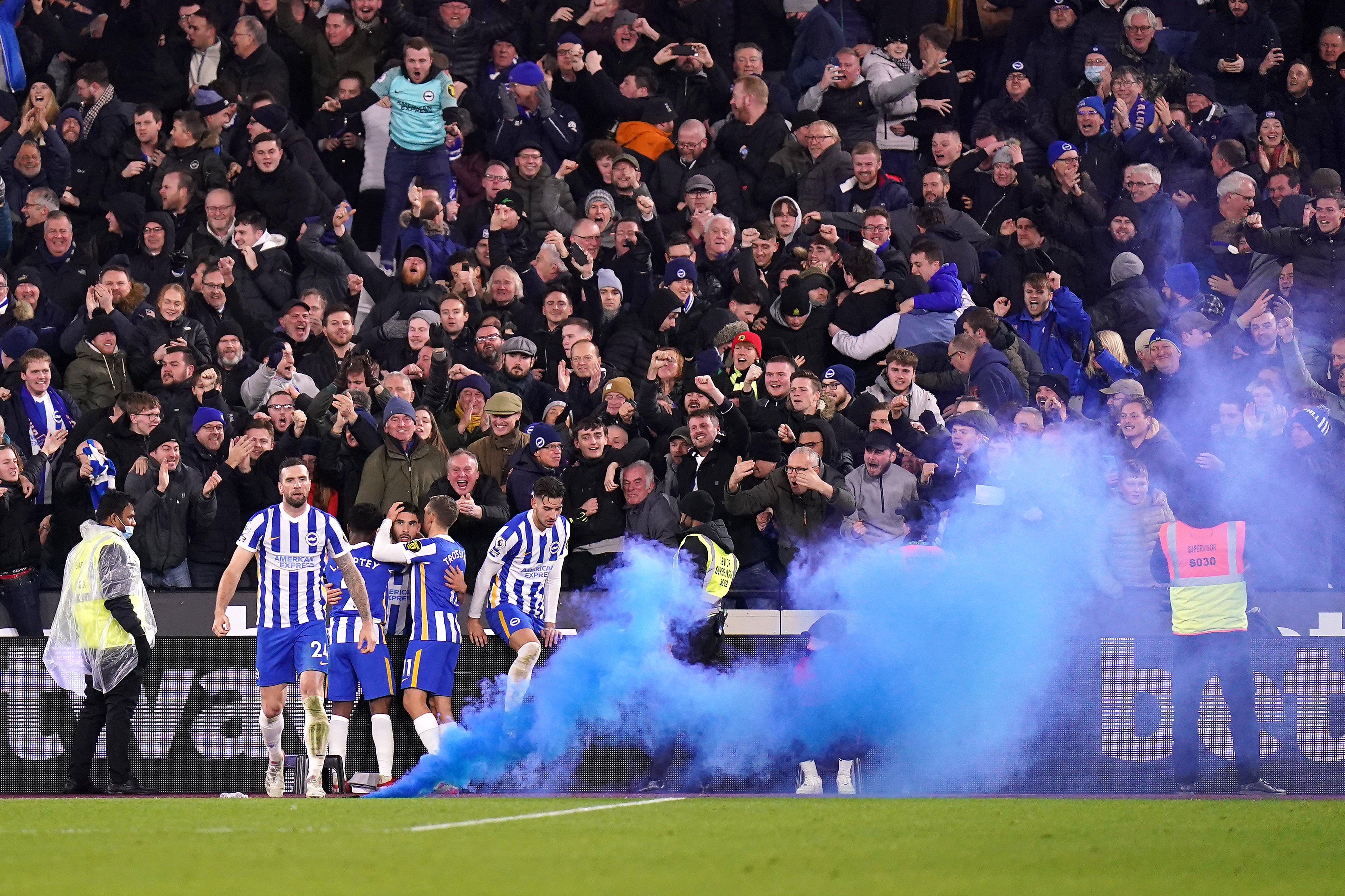 A smoke cannister was thrown onto the pitch at Brighton recently (Adam Davy/PA)