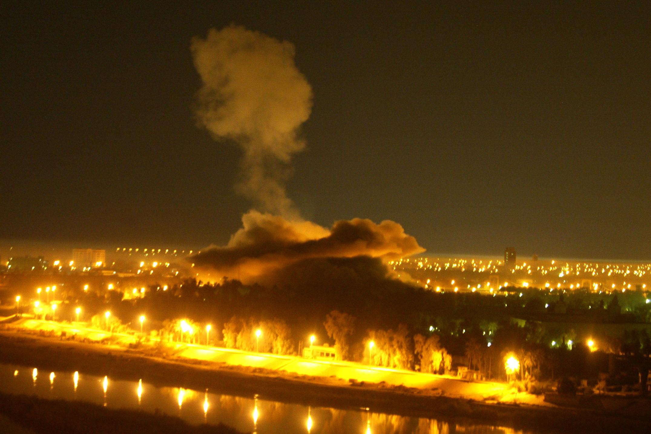 Smoke billows from an explosion in Iraqi president Saddam Hussein’s presidential palace in Baghdad during a coalition air raid in early April 2003