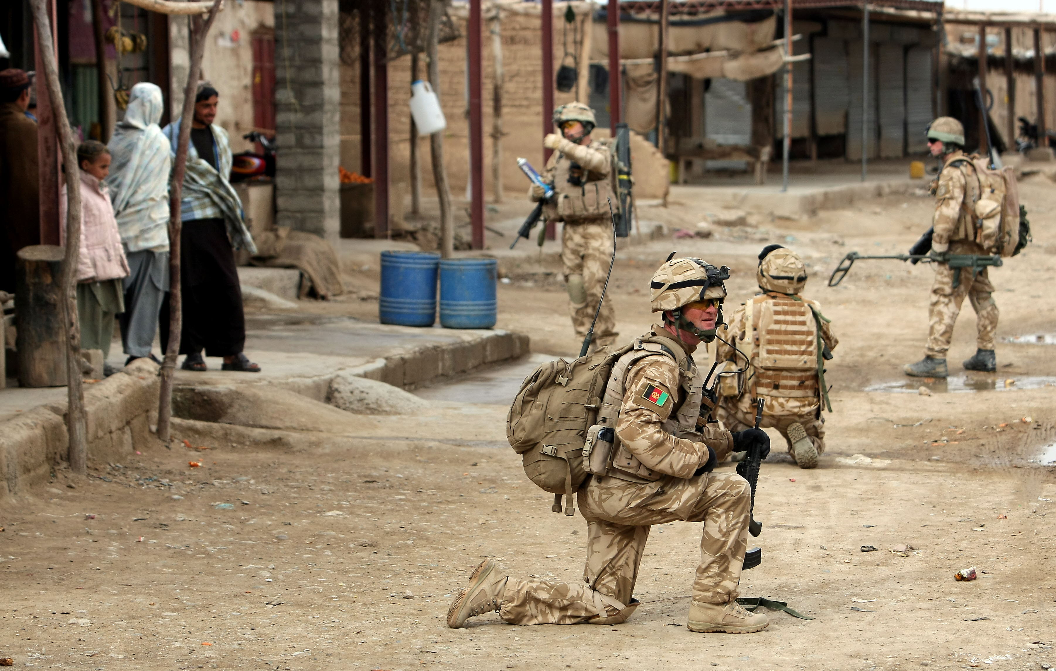 British soldiers patrol the streets of Showal in Nad-e-Ali district, southern Afghanistan, in 2010