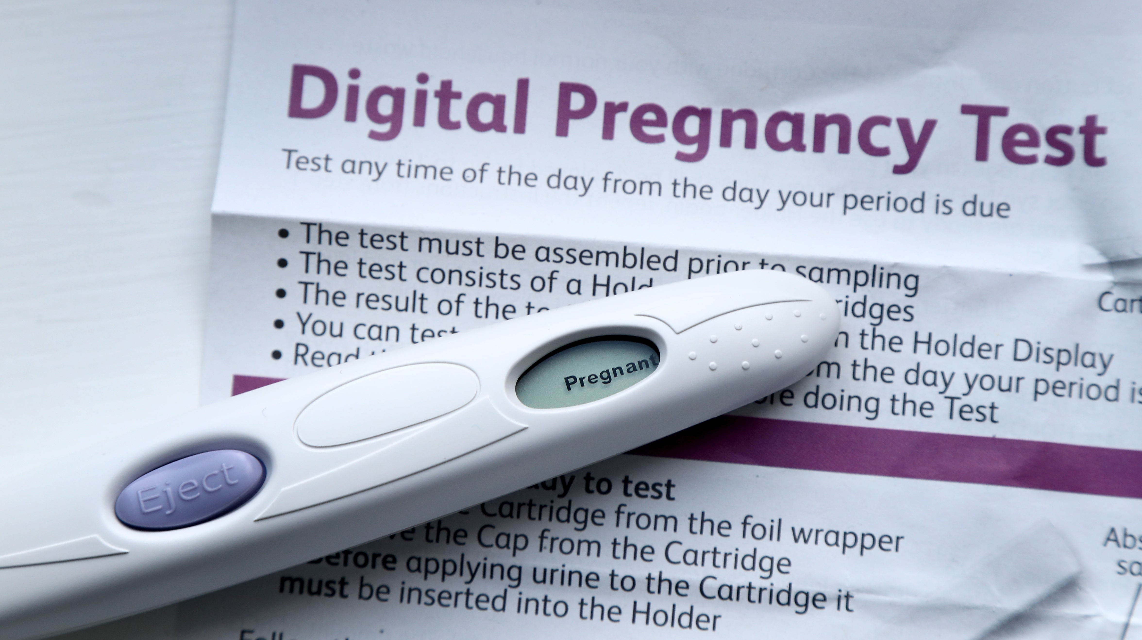 A pregnancy test kit indicating pregnancy (Gareth Fuller/PA)