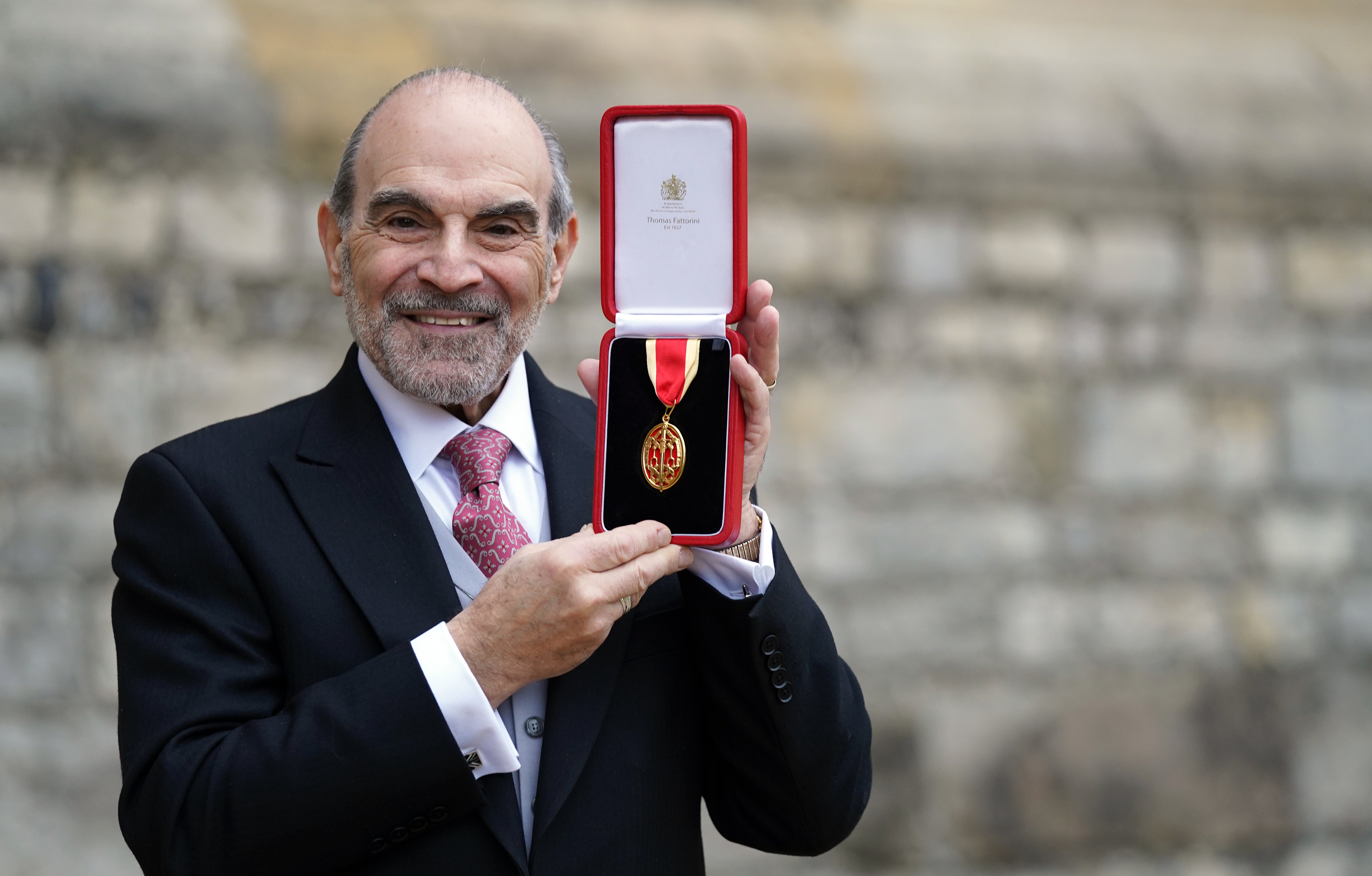 Actor Sir David Suchet after receiving his knighthood for services to drama and charity during an investiture ceremony at Windsor Castle (Steve Parsons/PA)