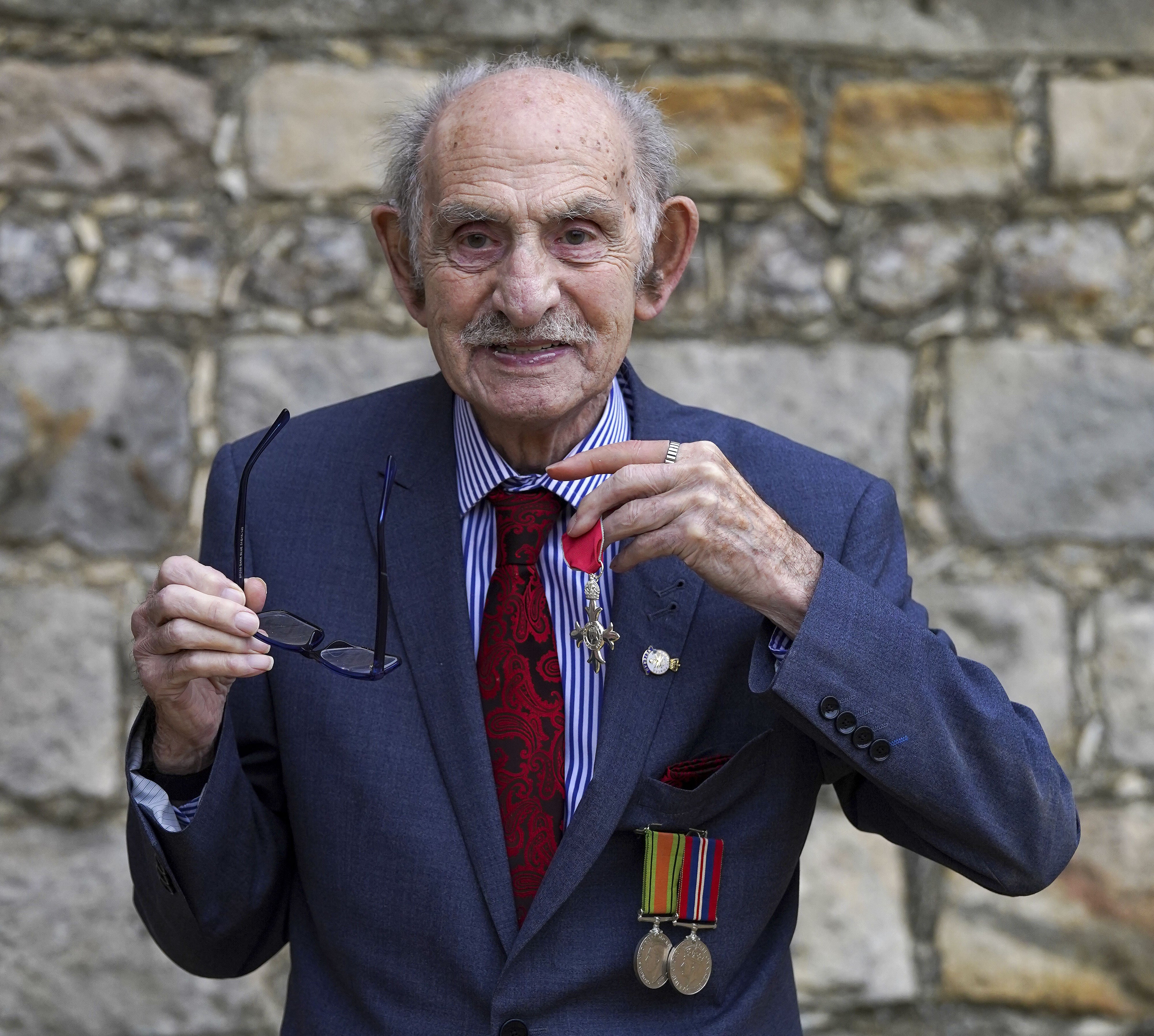 Henry Lewis, honorary vice president of The Magic Circle, after receiving an MBE at Windsor Castle (Steve Parsons/PA)