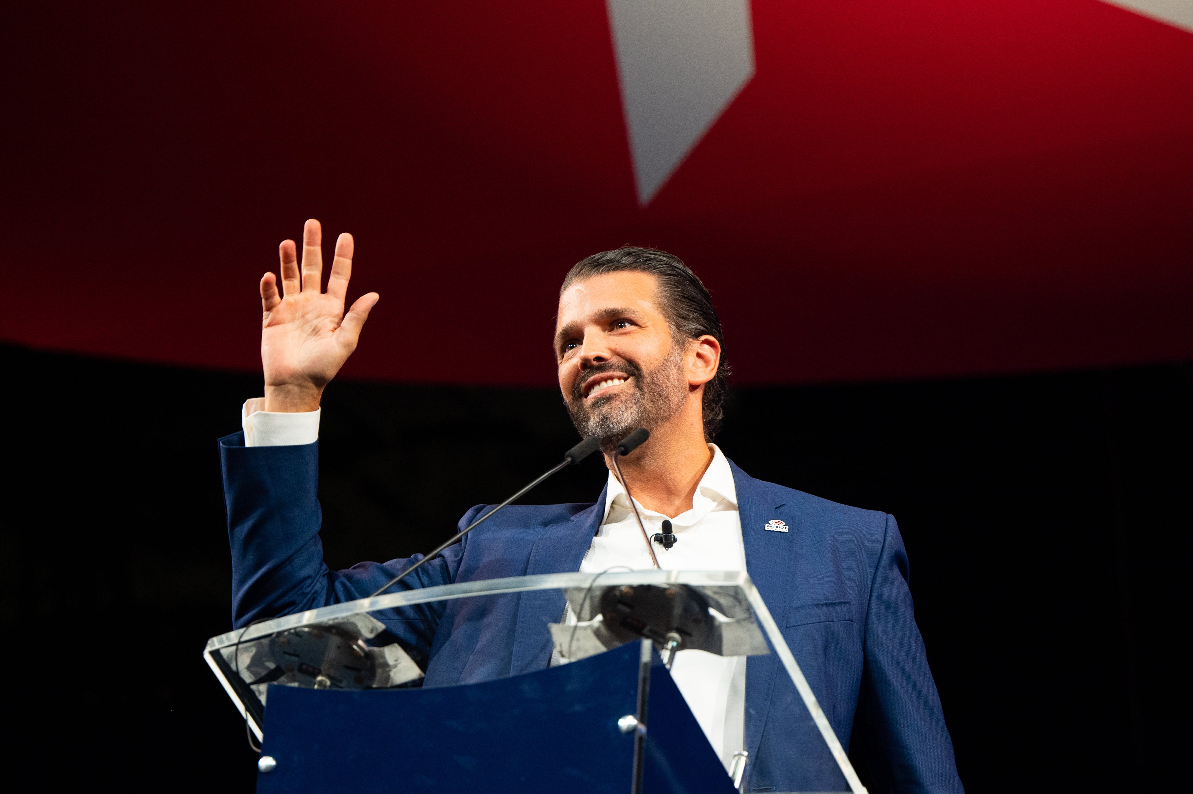 File: Donald Trump Jr waves after speaking during the Conservative Political Action Conference held at the Hilton Anatole on 9 July 2021 in Dallas, Texas