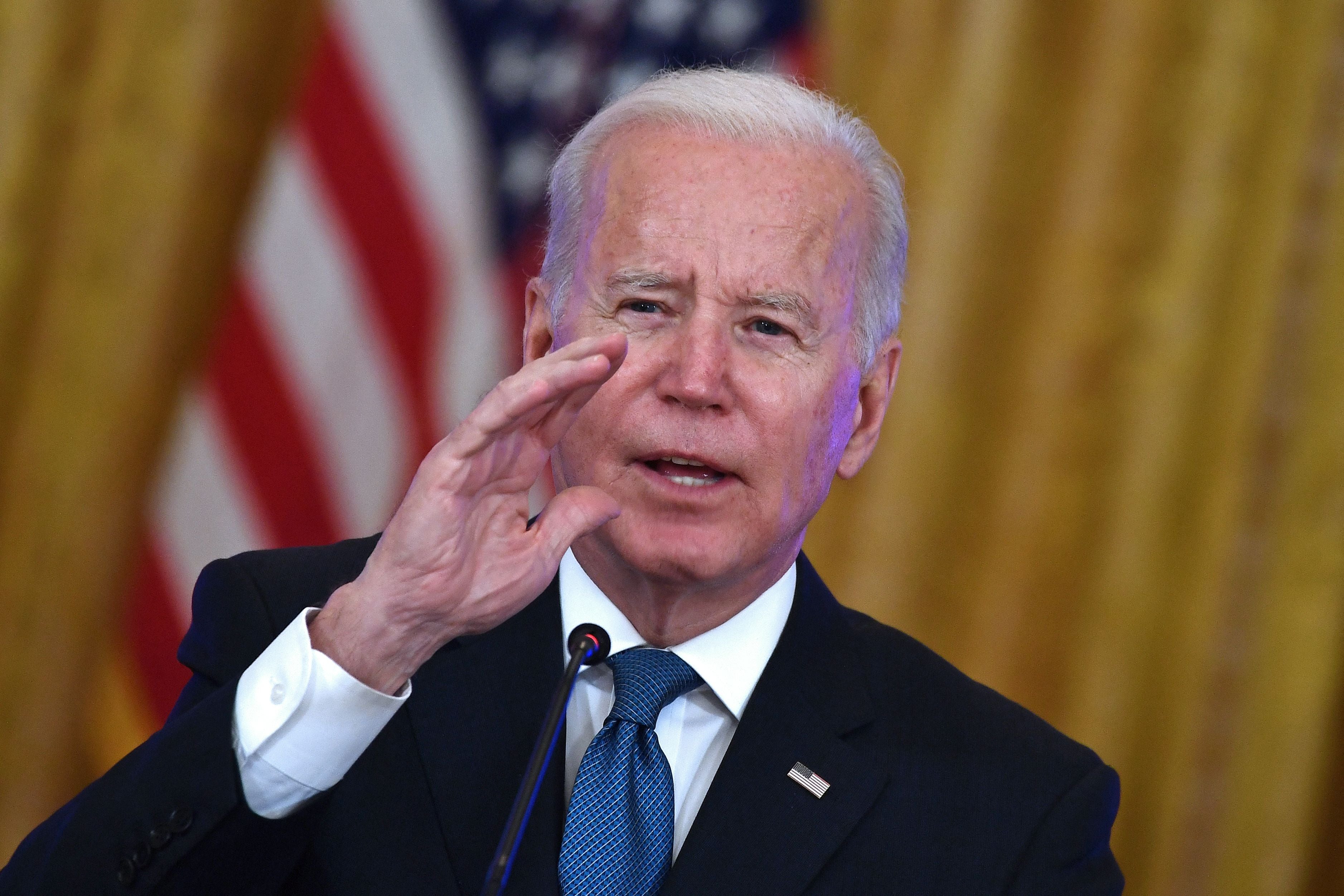 US President Joe Biden speaks as he meets with members of his administration on efforts to lower prices for working families at the East room of the White House, in Washington, DC on 24 January 2022