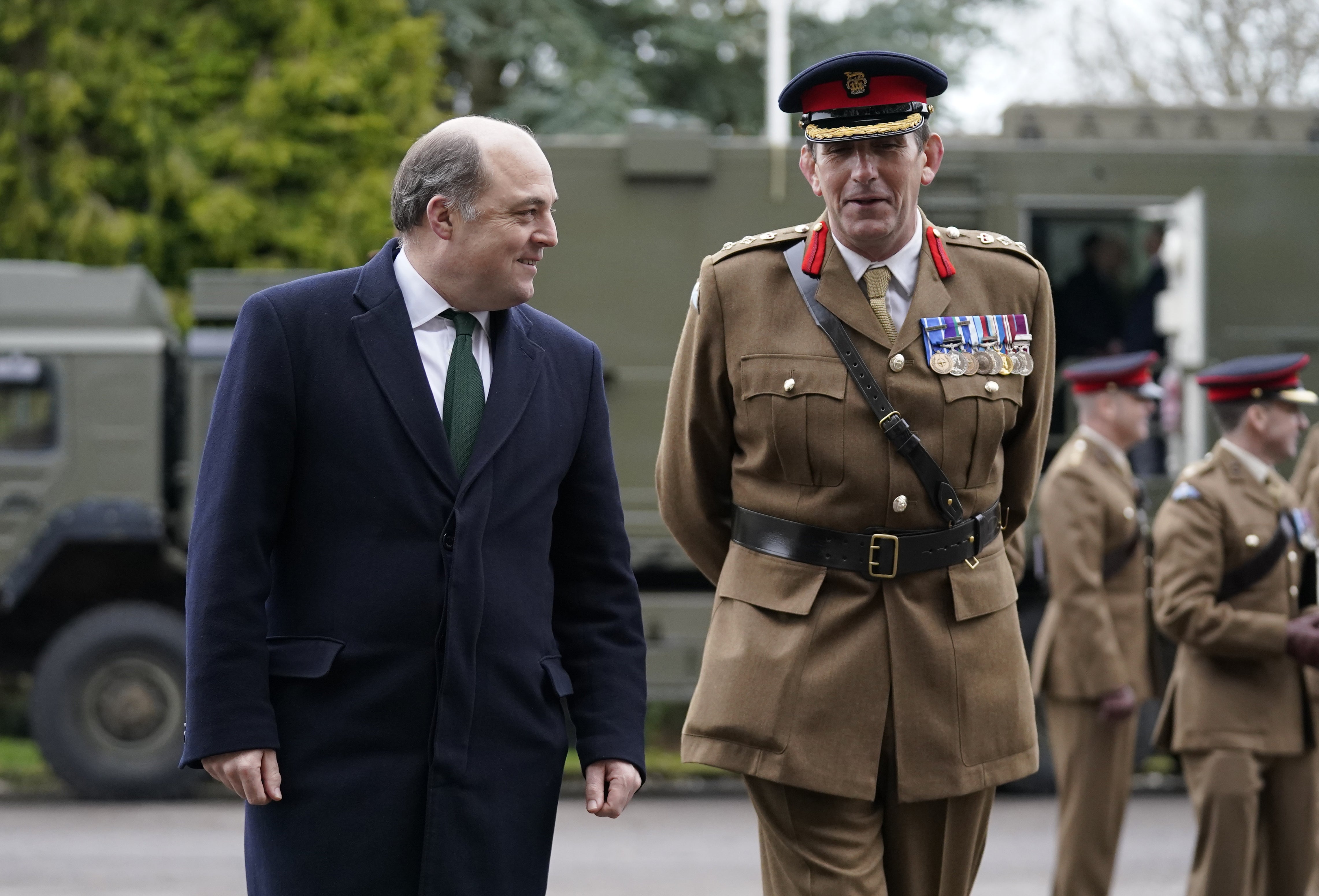 Defence Secretary Ben Wallace (left) after the change of colours parade at Baker Barracks on Thorney Island, West Sussex, as the 16 Regiment Royal Artillery bids farewell to its Rapier missiles and welcomes in the all new state-of-the-art Sky Sabre air defence system as its ceremonial colours (Andrew Matthews/PA)