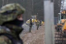 Poland starts building metal wall on border with Belarus