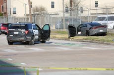 Houston police hunt gunman after three officers are shot