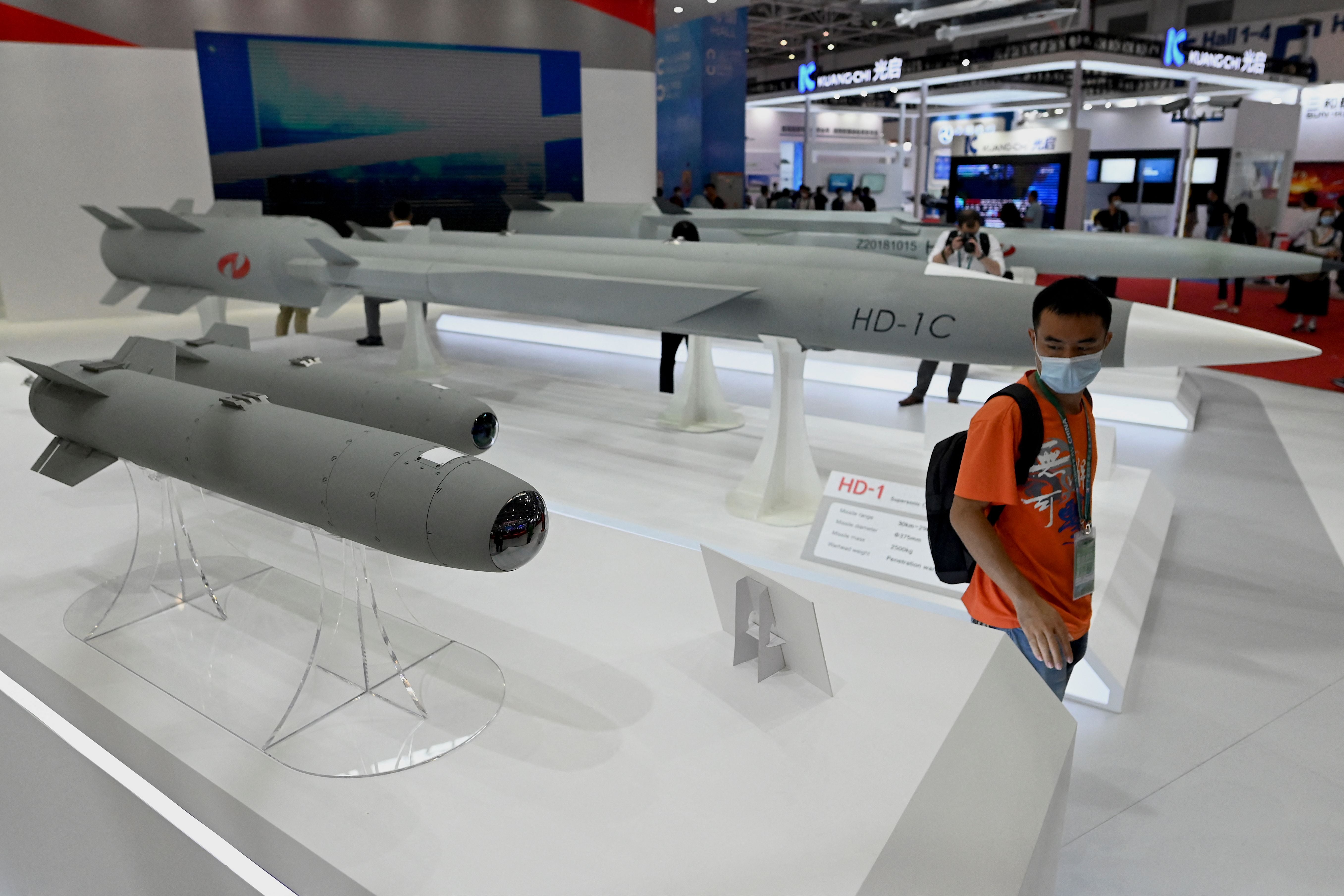 File: Man walks among supersonic cruise missiles at the 13th China International Aviation and Aerospace Exhibition in Zhuhai in southern China’s Guangdong province on 28 September 2021