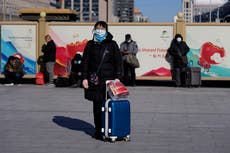 Chinese travel for Lunar New Year despite plea to stay put