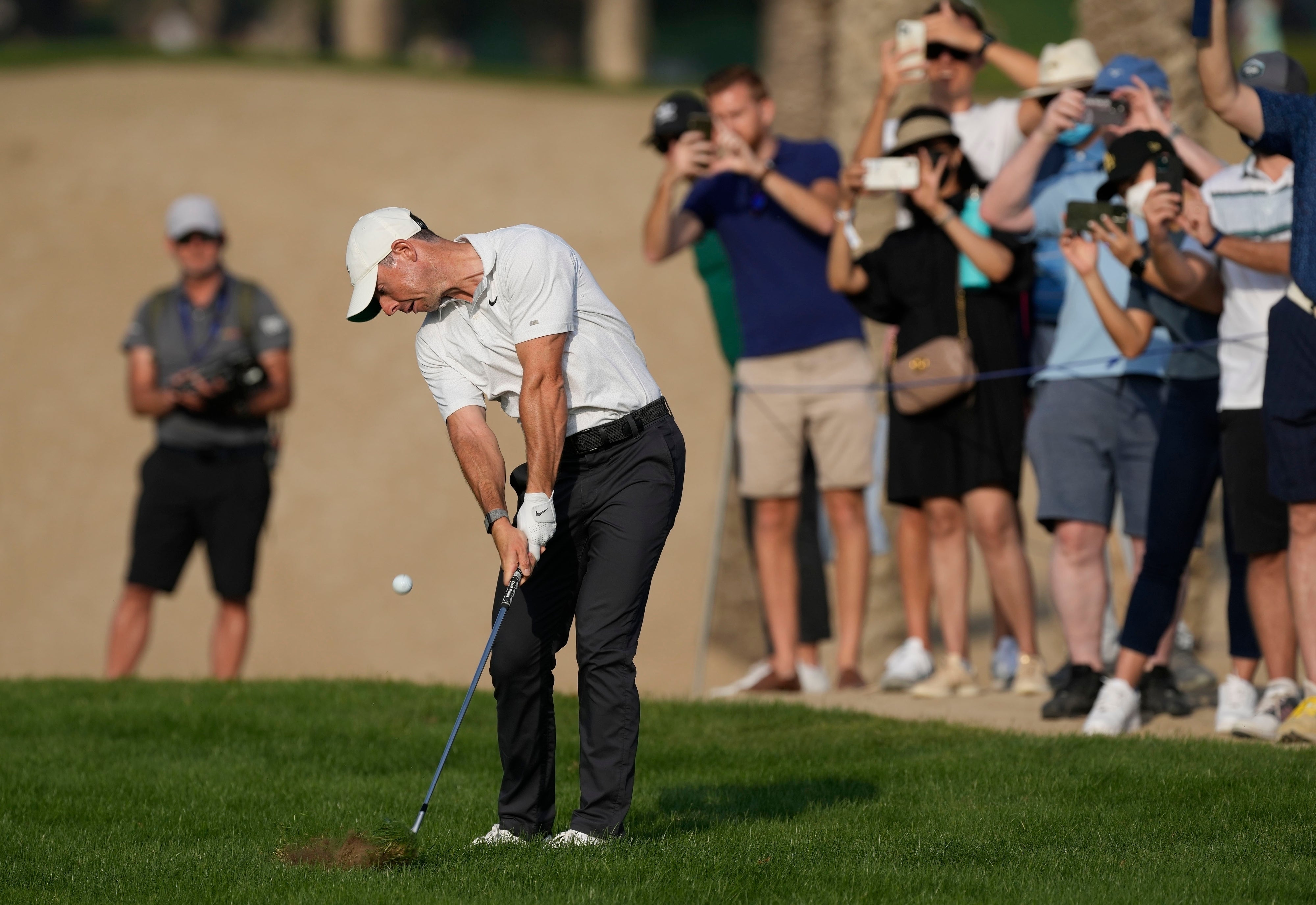 Rory McIlroy is four shots off the lead at the halfway stage of the Dubai Desert Classic (Kamran Jebreili/AP)