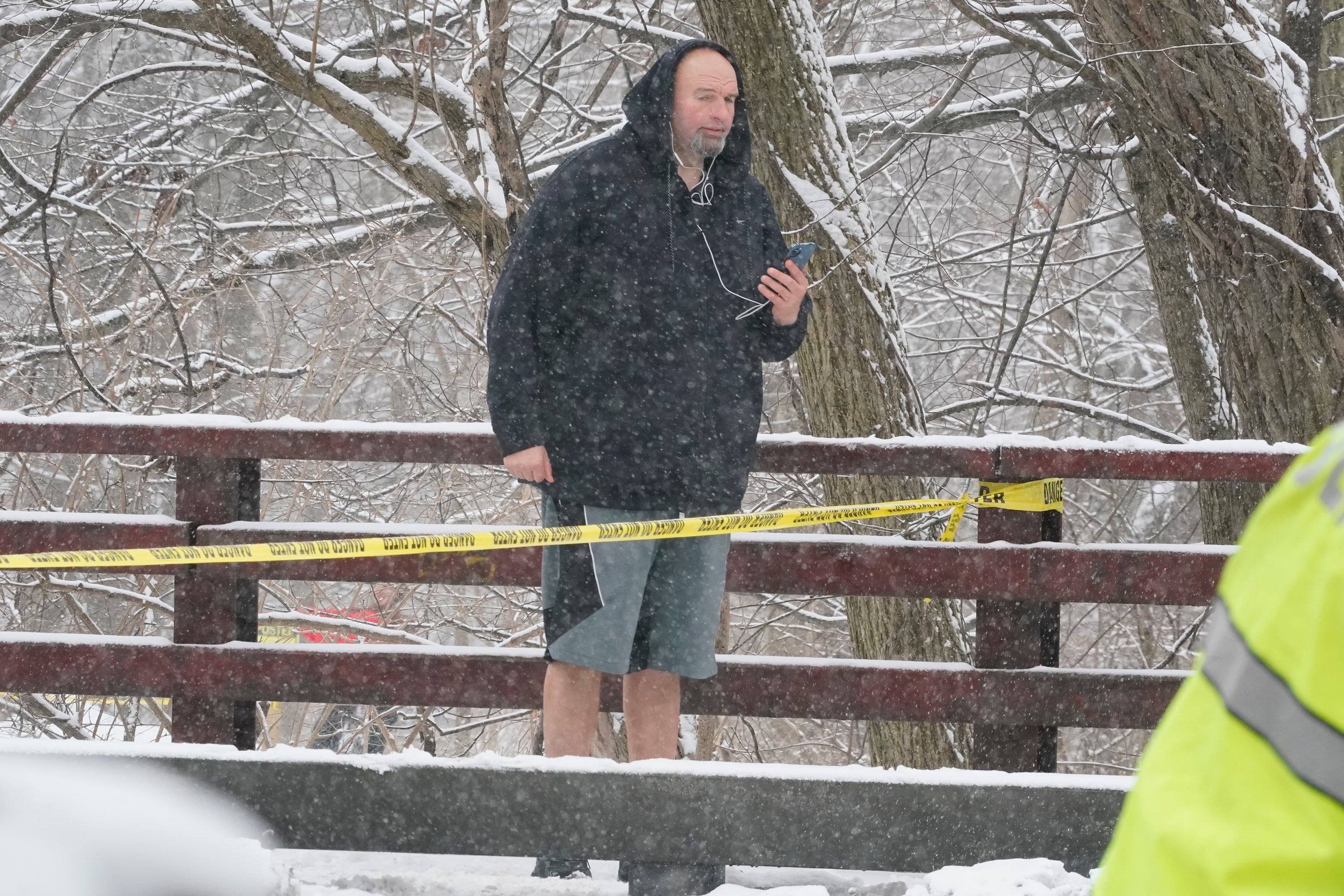 Pennsylvania Lt Governor John Fetterman walks near the scene where a bridge collapsed in Pittsburgh's East End, Friday Jan 28, 2022