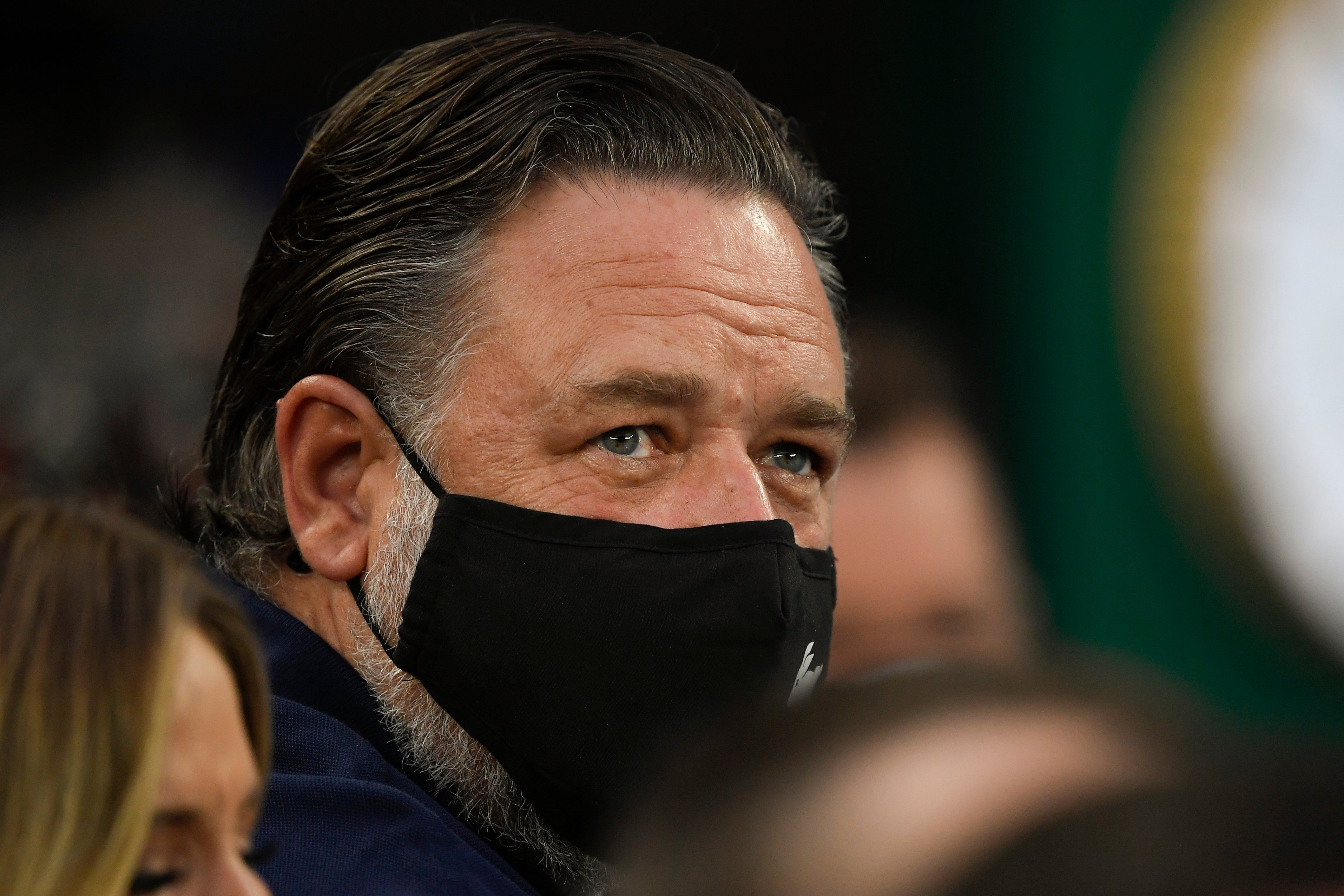 Russell Crowe watches the women’s final (Andy Brownbill/AP)