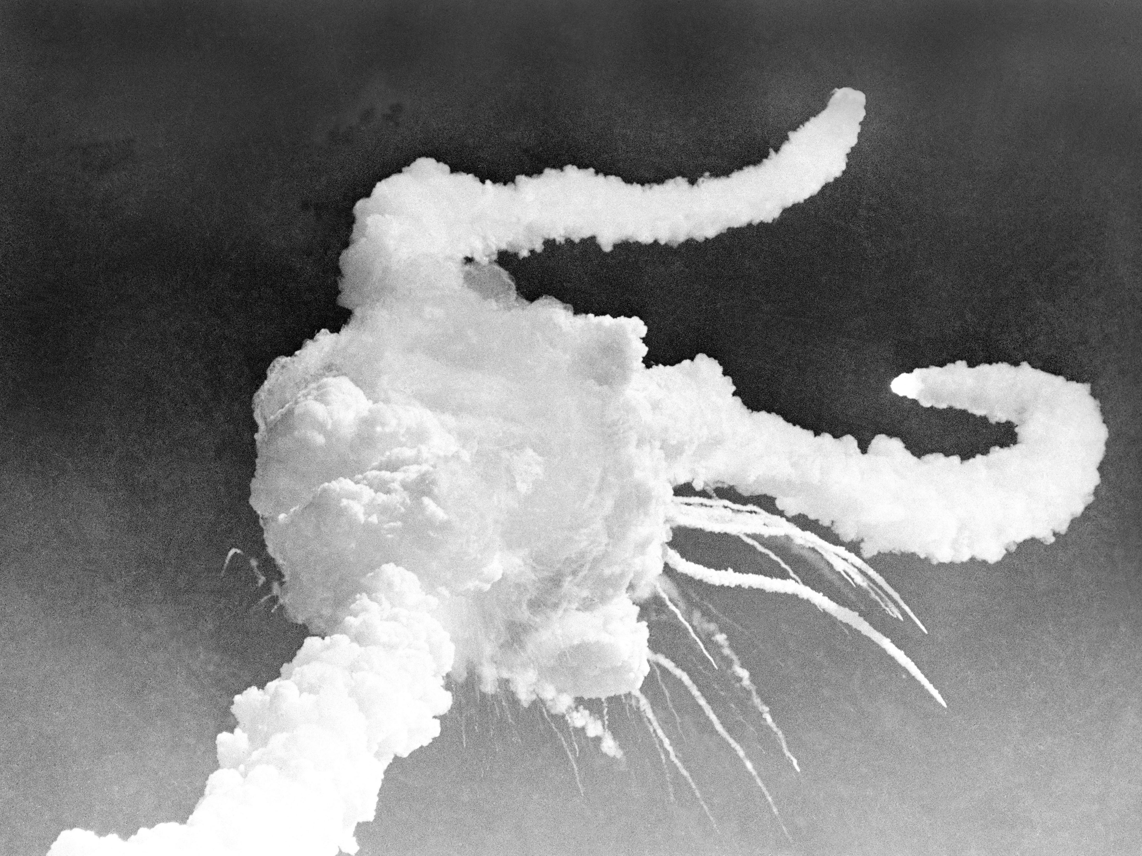 The Space Shuttle Challenger explodes on 28 January 1986