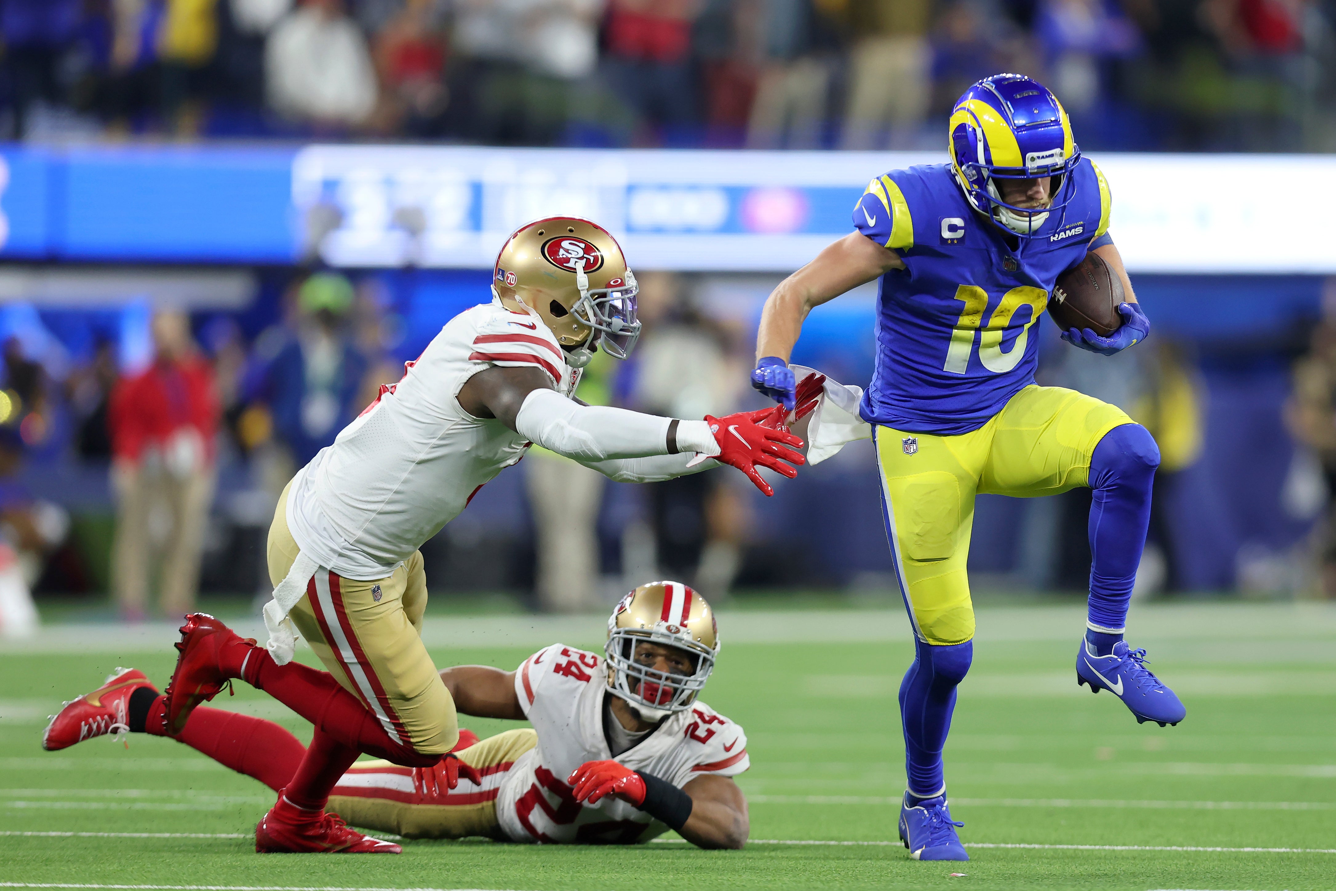 Cooper Kupp evades a tackle