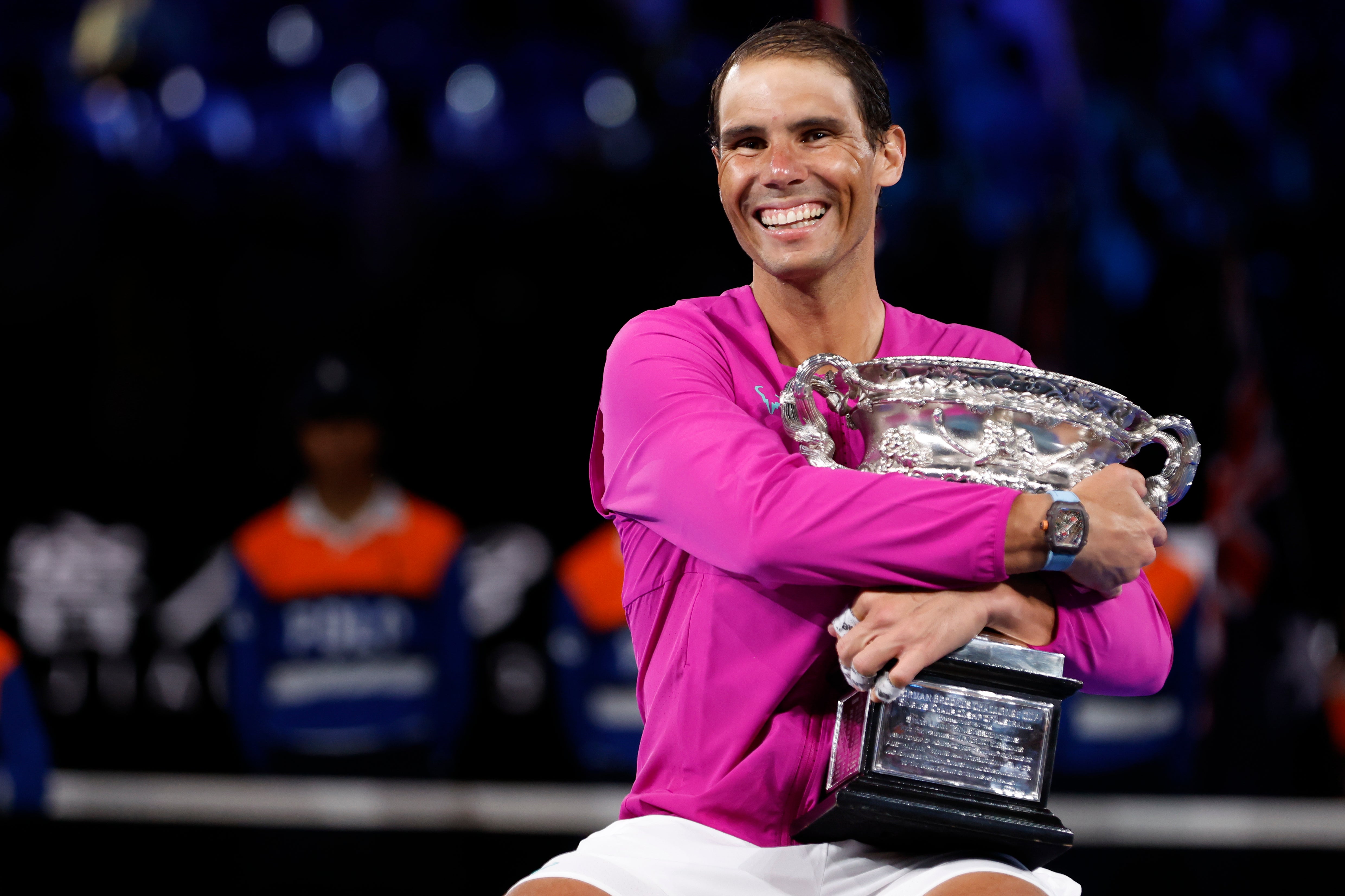 Rafael Nadal hugs the Normal Brookes Challenge Cup (Hamish Blair/AP)