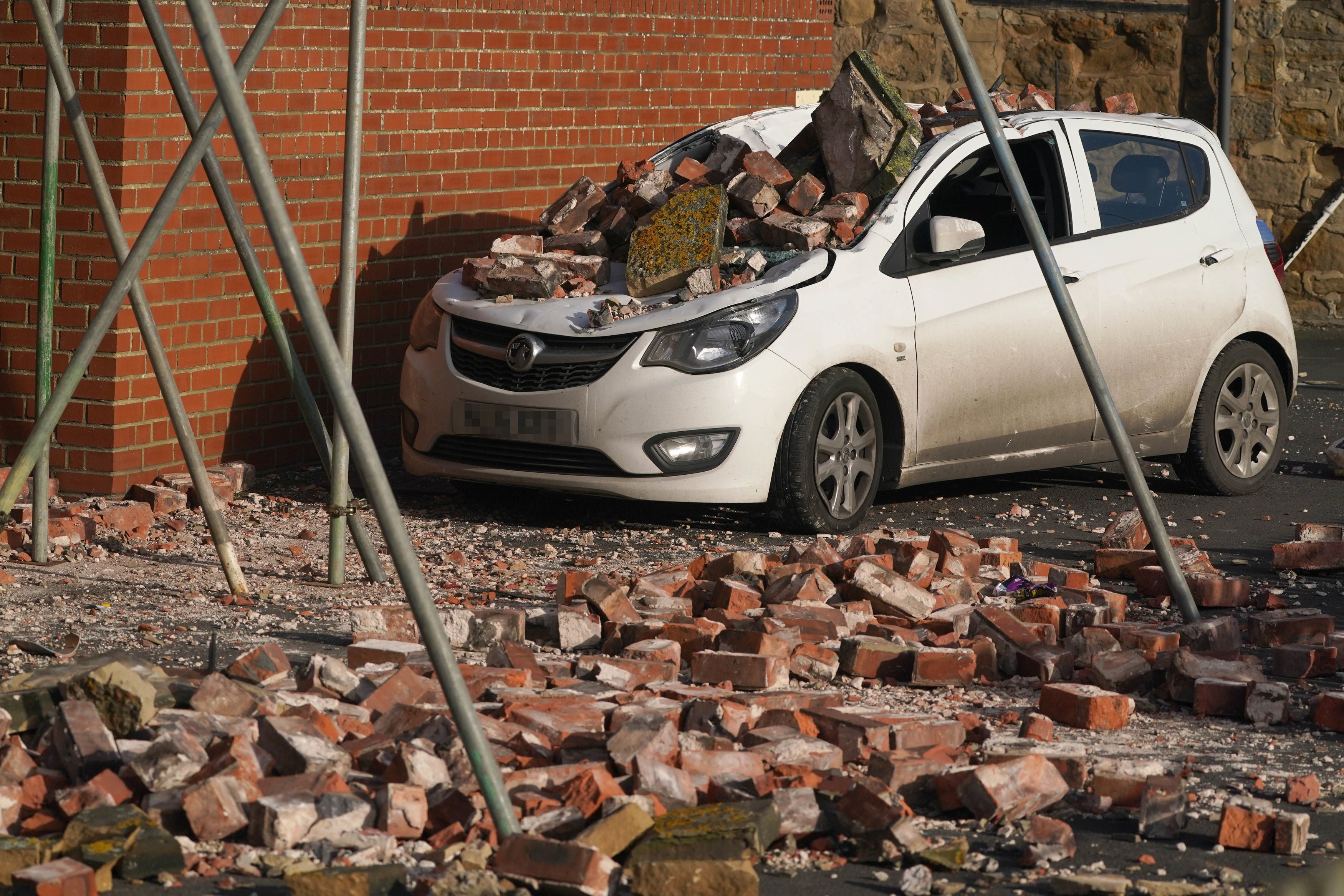 A car crushed by fallen bricks in Seaton Sluice, Northumberland after strong winds