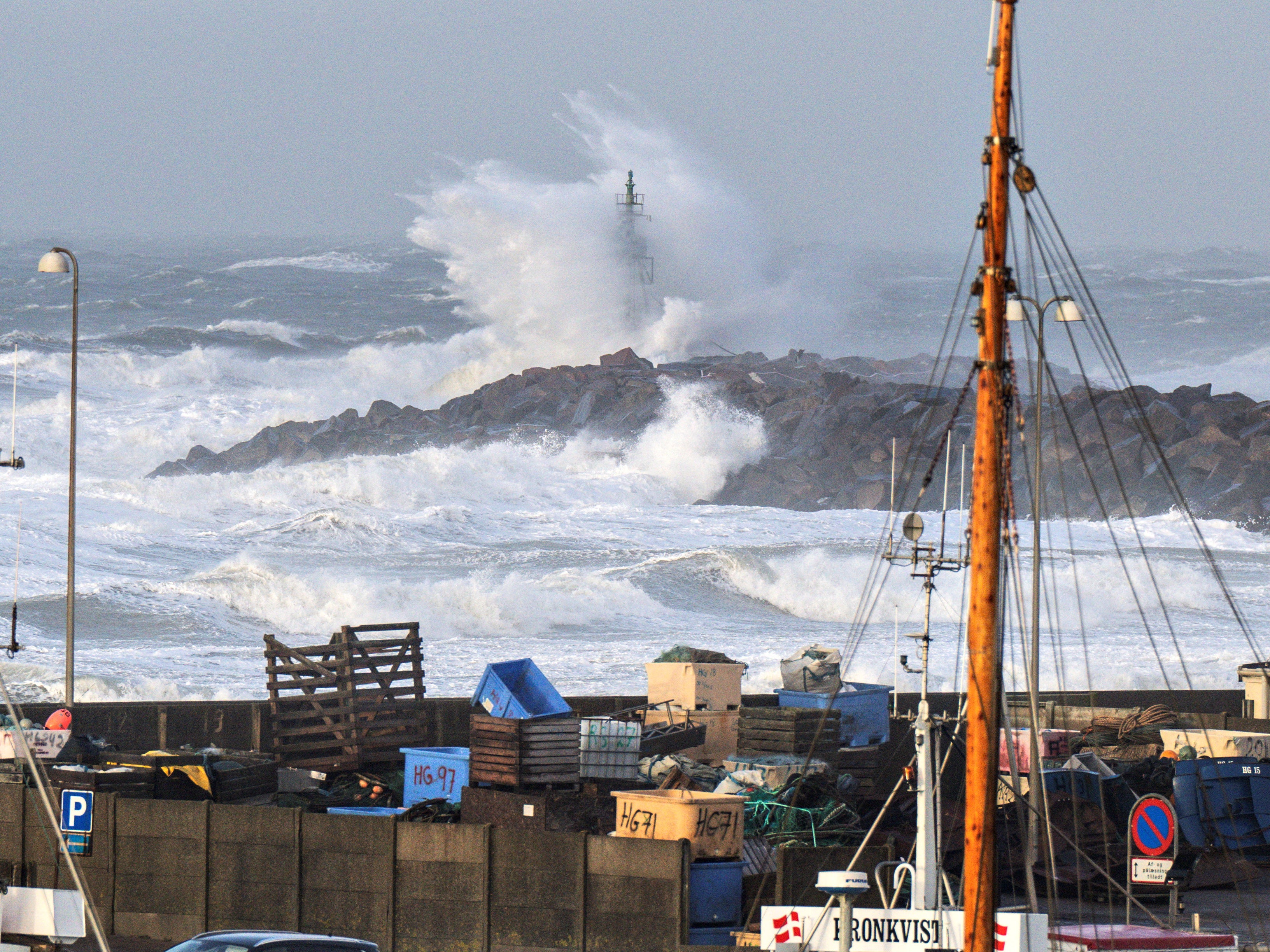 Rescue helicopters have evacuated all 18 crew members from a ship left drifting rudderless off the Dutch North Sea coast after it collided with another ship during Storm Corrie