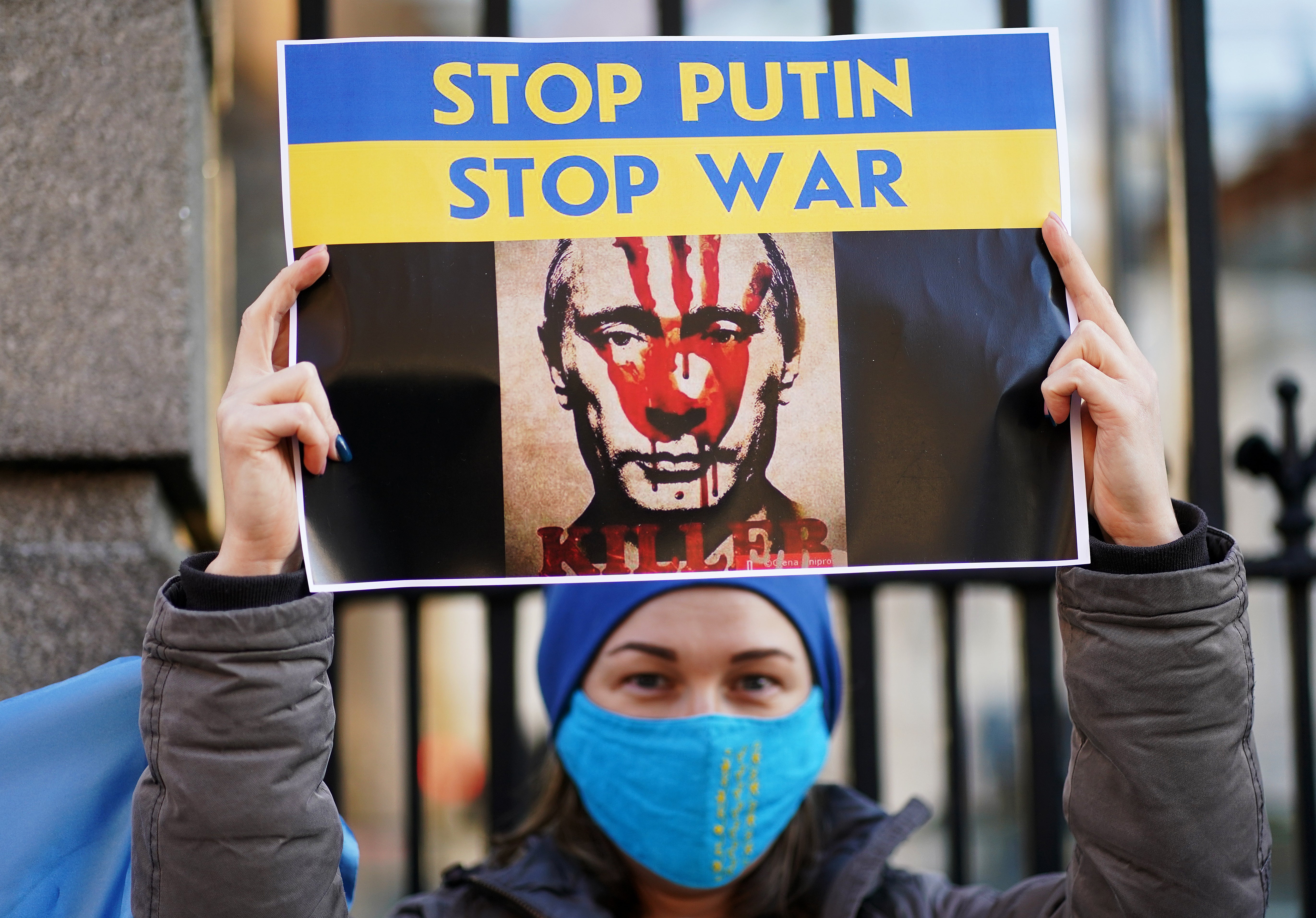 A woman attends a rally as members of the Ukrainian community in Ireland gathered at Leinster House, Dublin (Brian Lawless/PA)