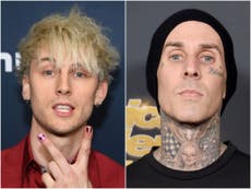 Machine Gun Kelly changes album title after getting it tattooed on Travis Barker