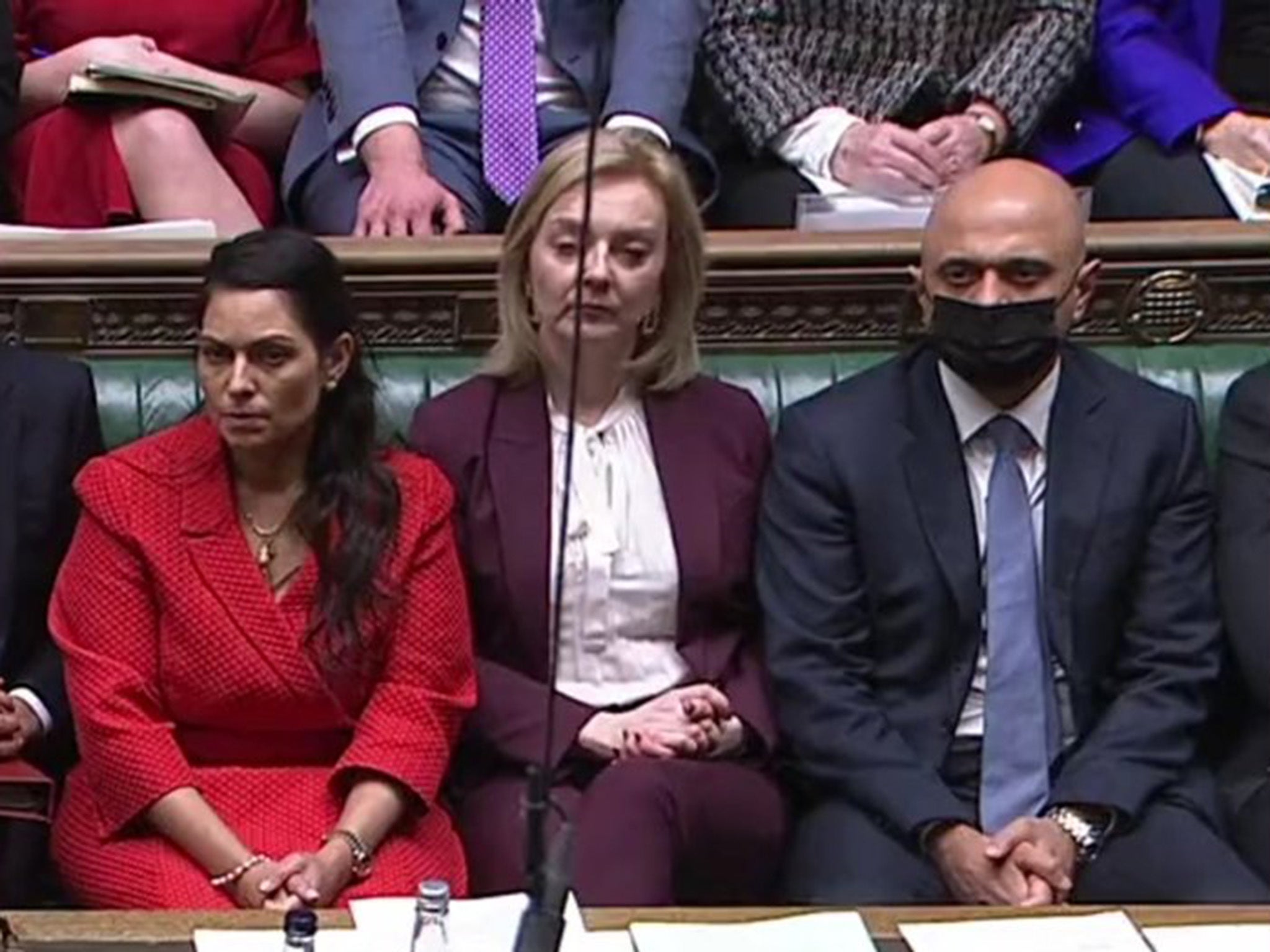 A maskless Liz Truss sits in the Commons on Monday