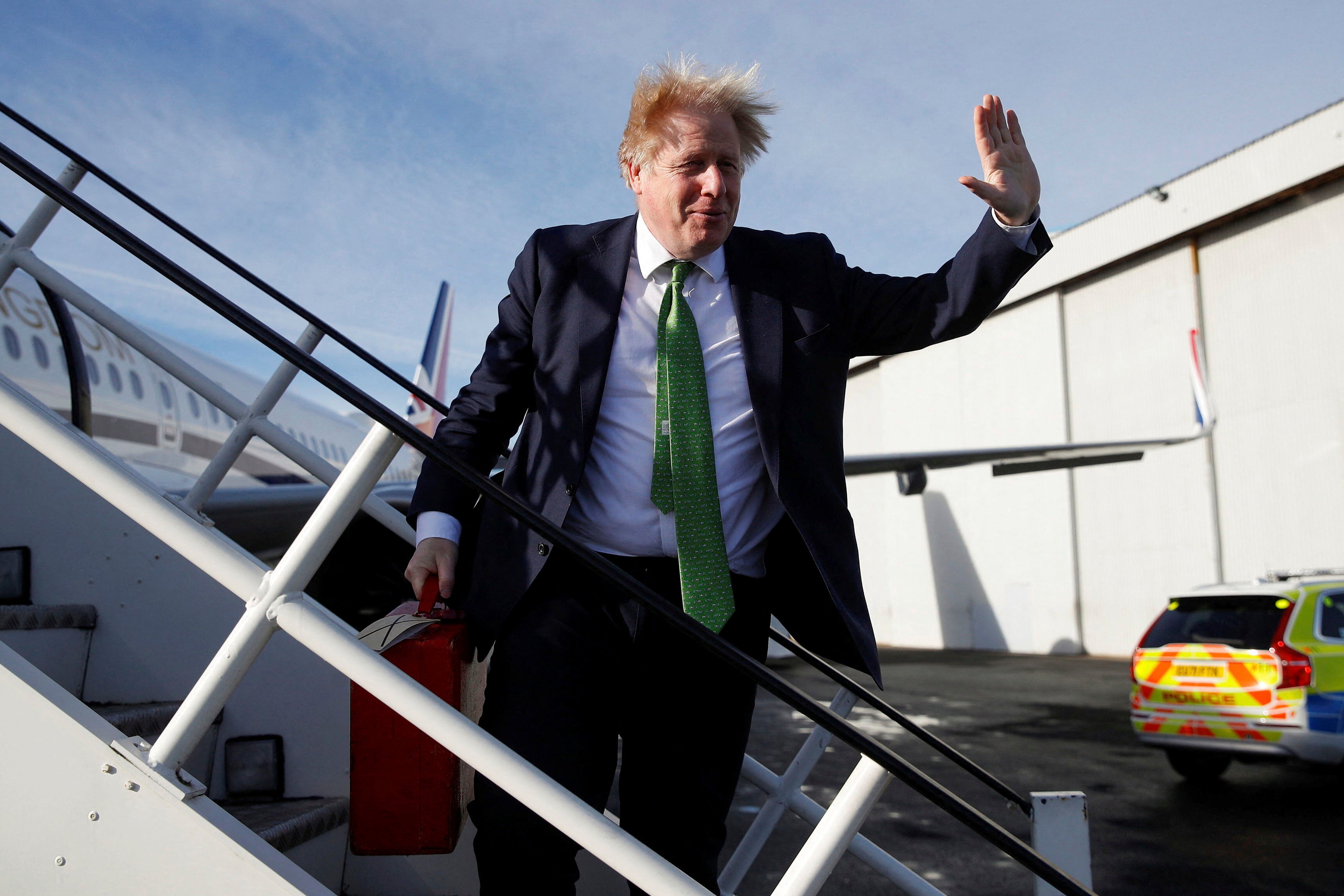 British Prime Minister Boris Johnson boards an aircraft on his way to Ukraine