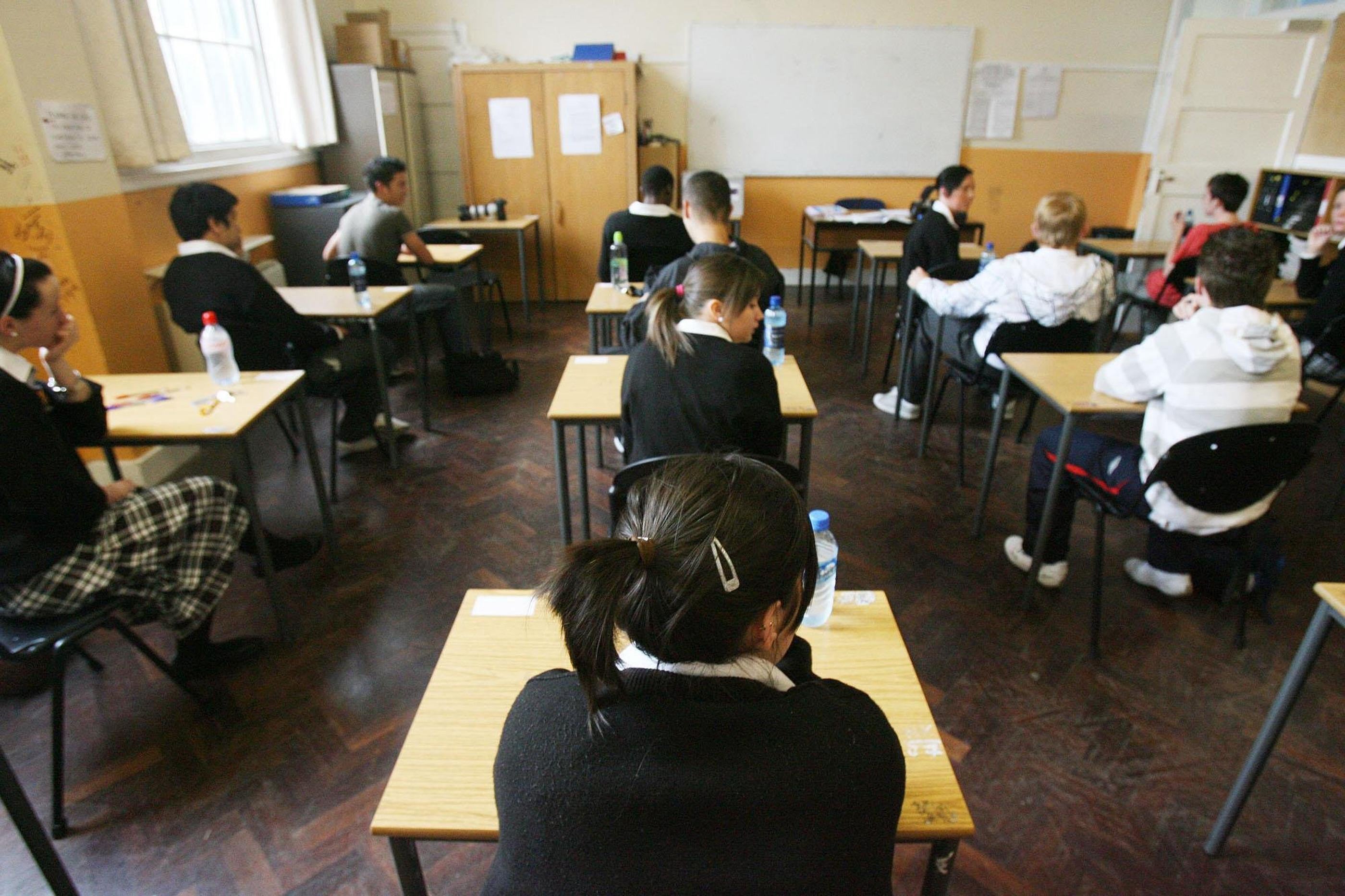 Students prepare to sit exams (Niall Carson/PA)