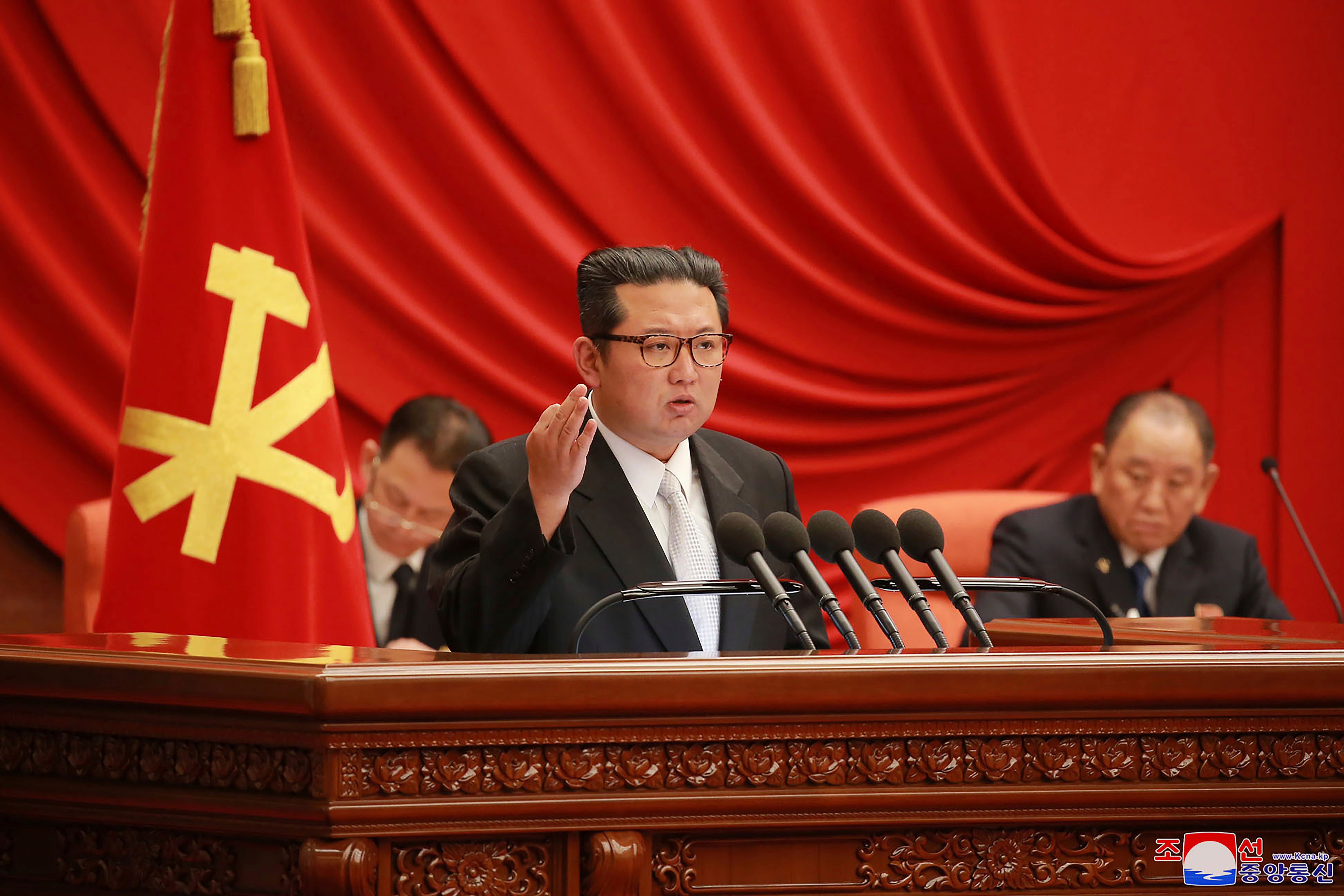 Kim Jong-un speaking at a ruling party meeting in late December