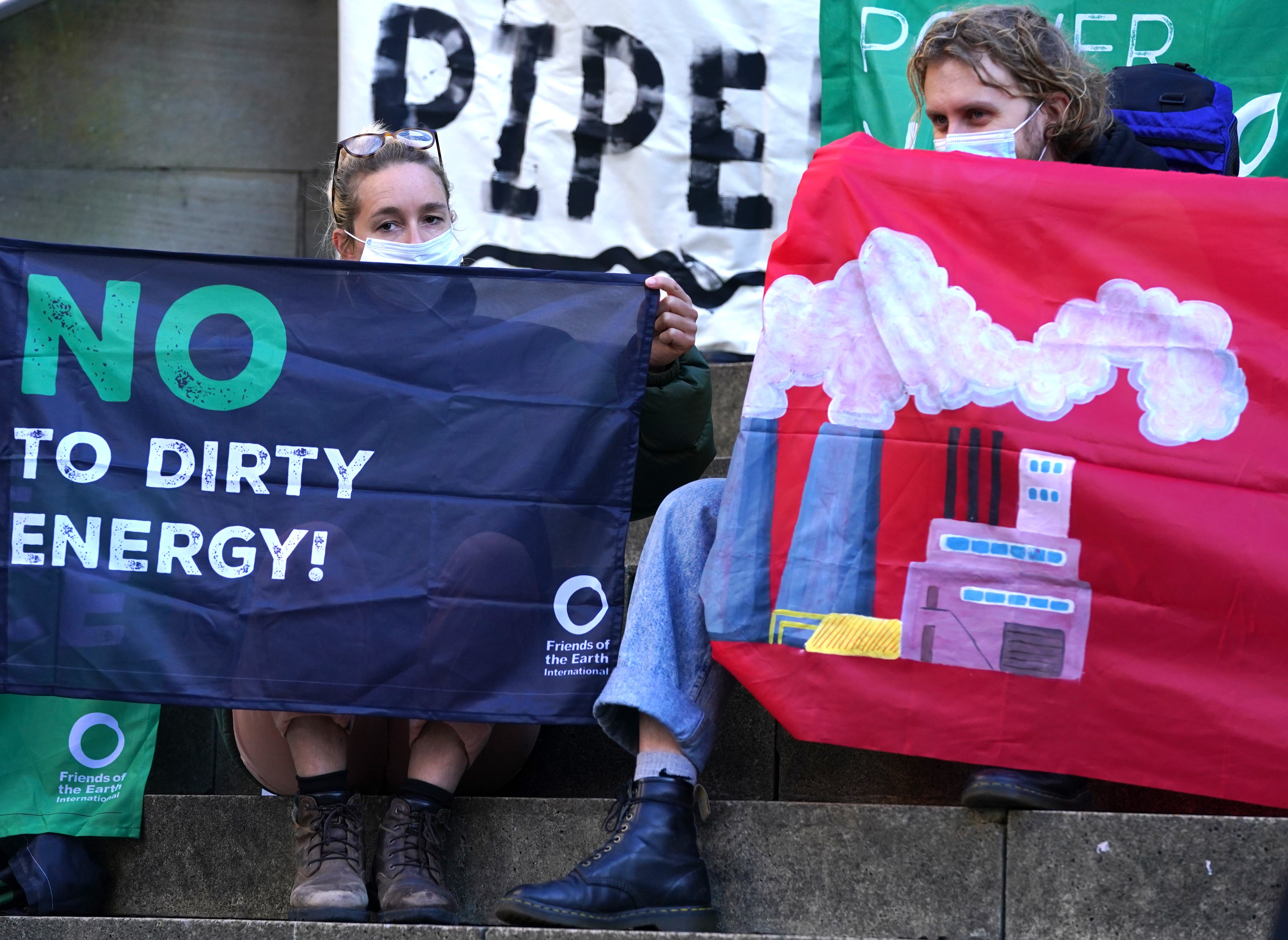 Climate activists taking to the streets of Glasgow during the city’s Cop26 event in November last year, protesting oil and gas projects (Andrew Milligan/PA)