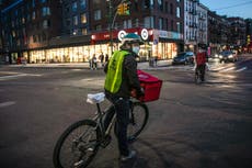 Food delivery workers, ride-share drivers demand more rights