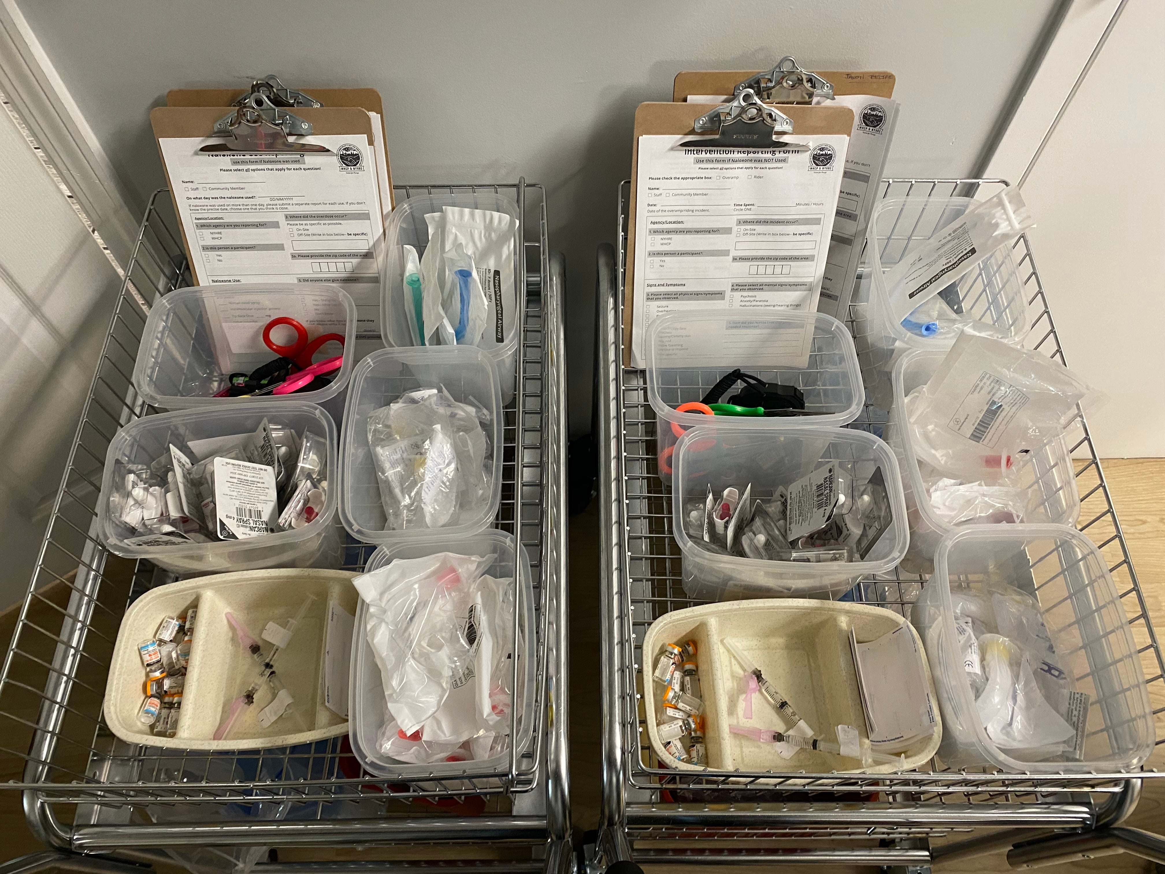 Medication to treat overdoses are arranged on a cart inside a a supervised drug-injection site in Harlem, New York.