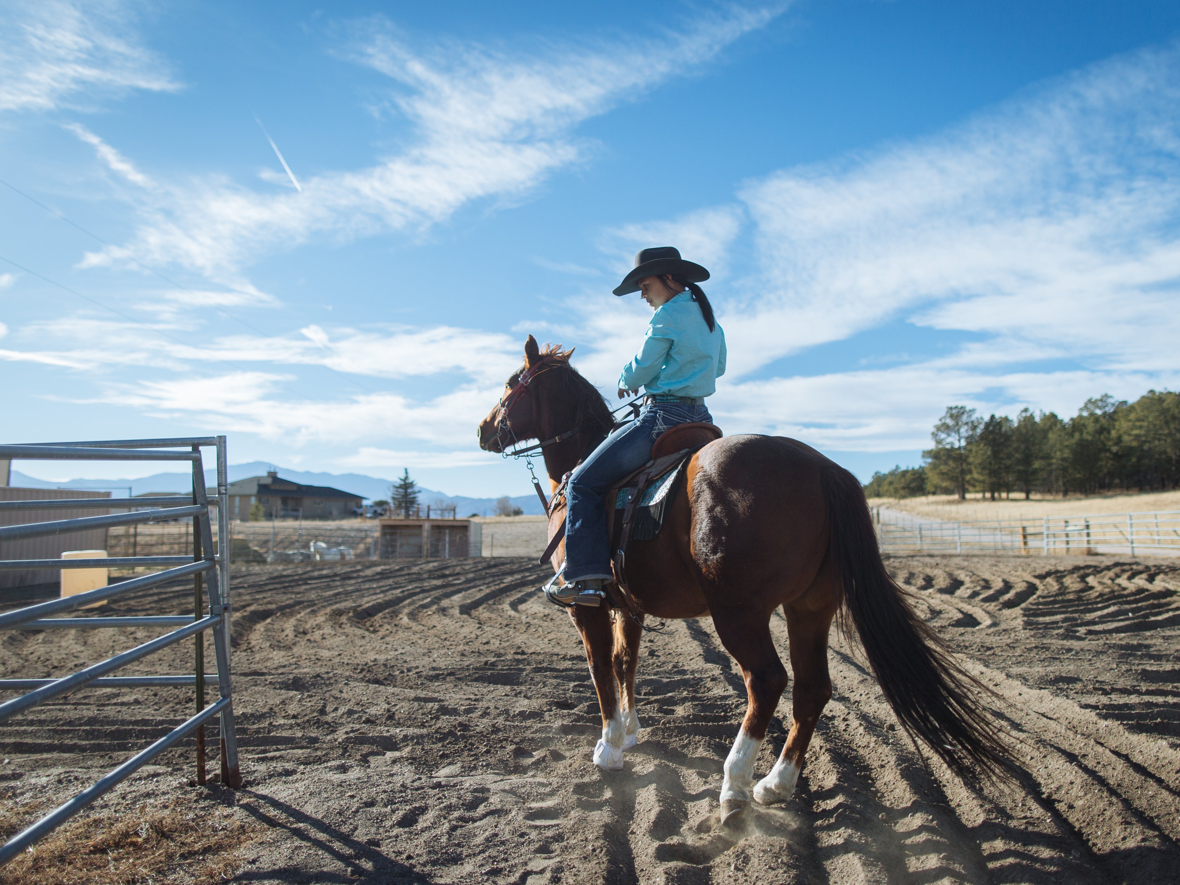 The girls ride and train their horses at the family farm in Colorado Springs