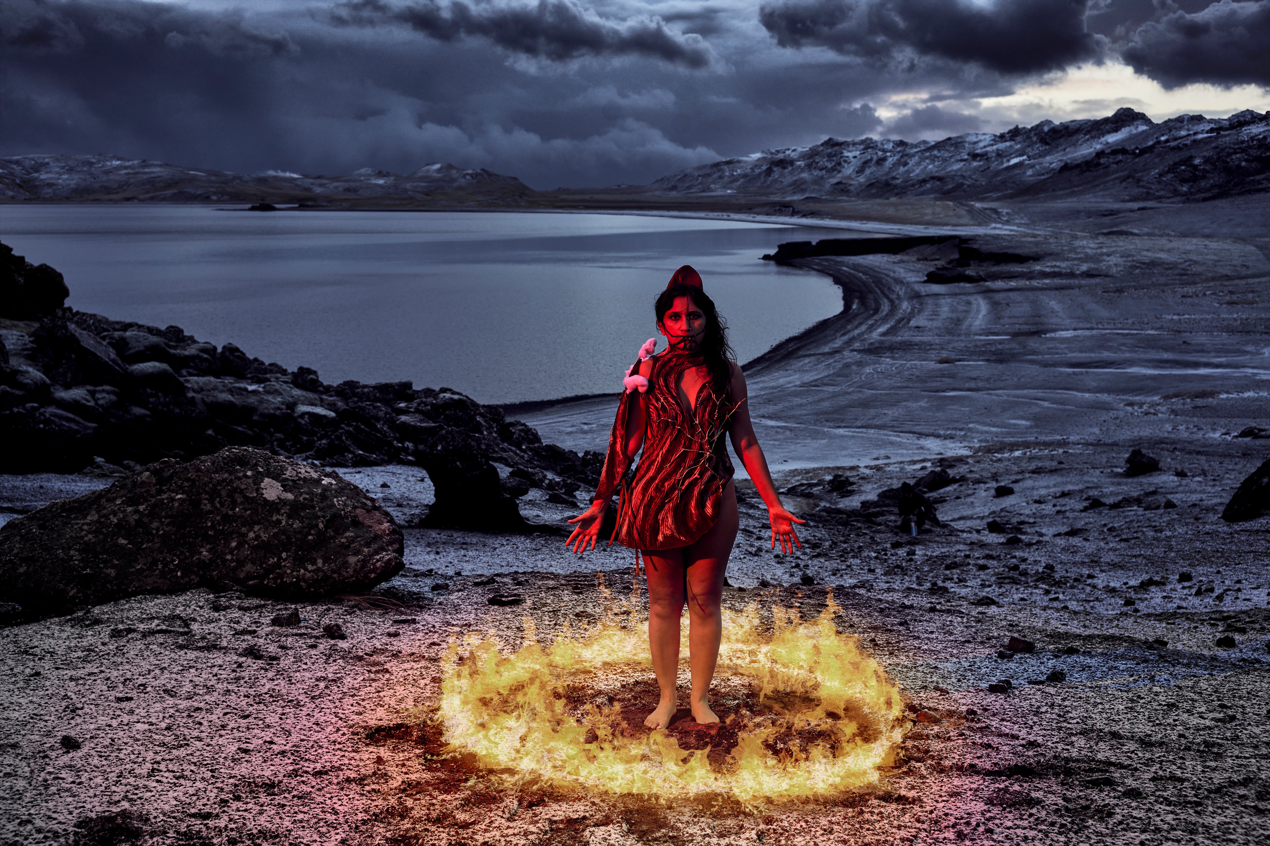 Power and fire: This artwork shows the power and fire of a woman set in a landscape that is on the front line of climate change